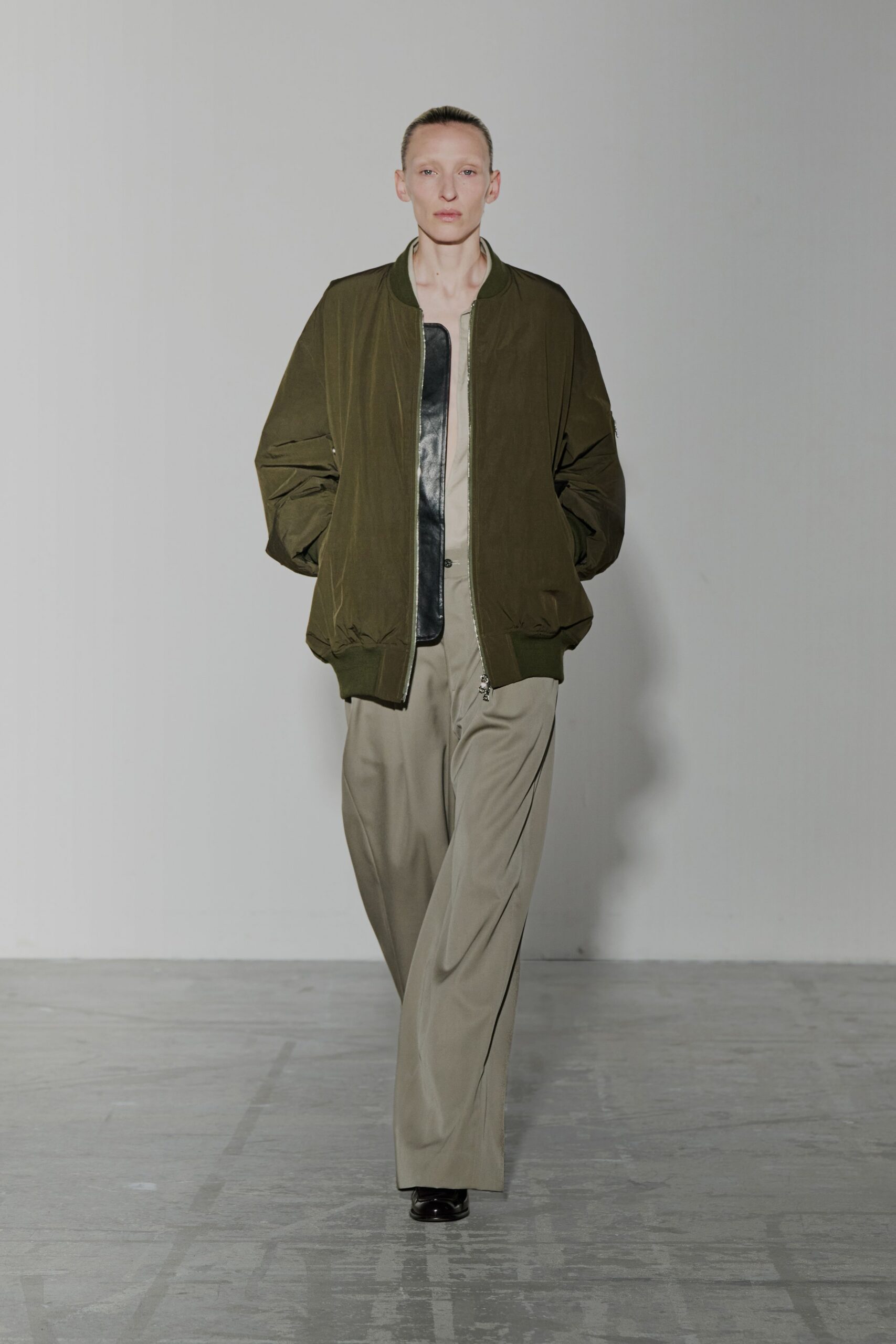 green oversized jacket with beige top