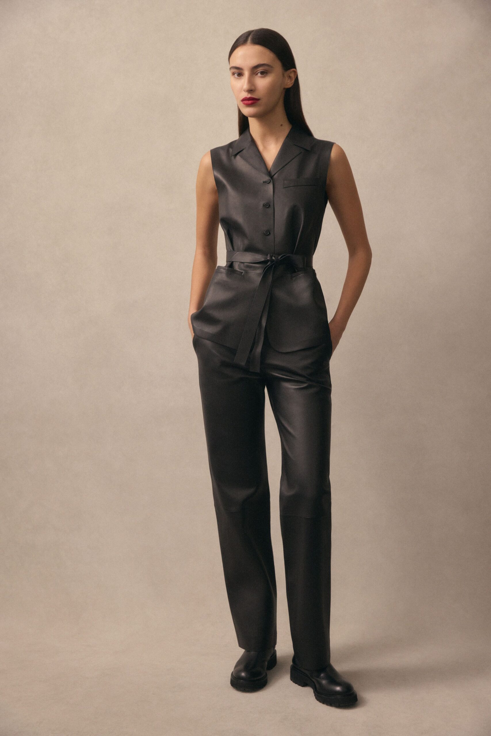 black silk sleeveless collared fitted belted jumpsuit