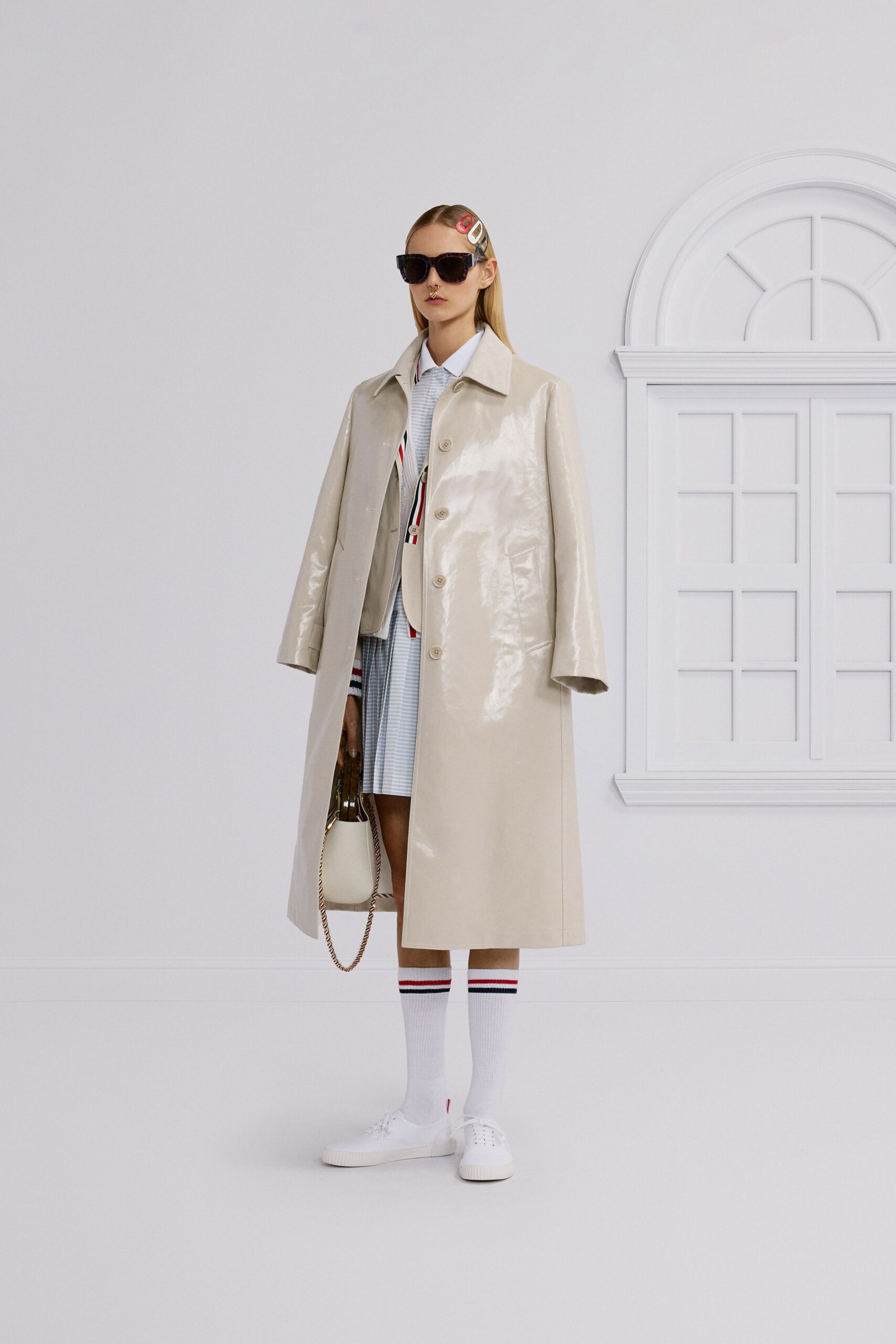 beige vinyl long-sleeve collared relaxed buttoned shiny coat