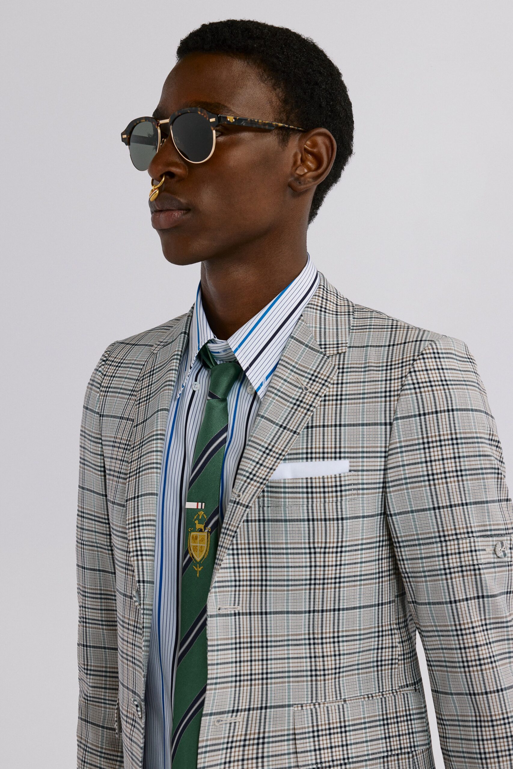 multi-colored tailored suit with sunglasses