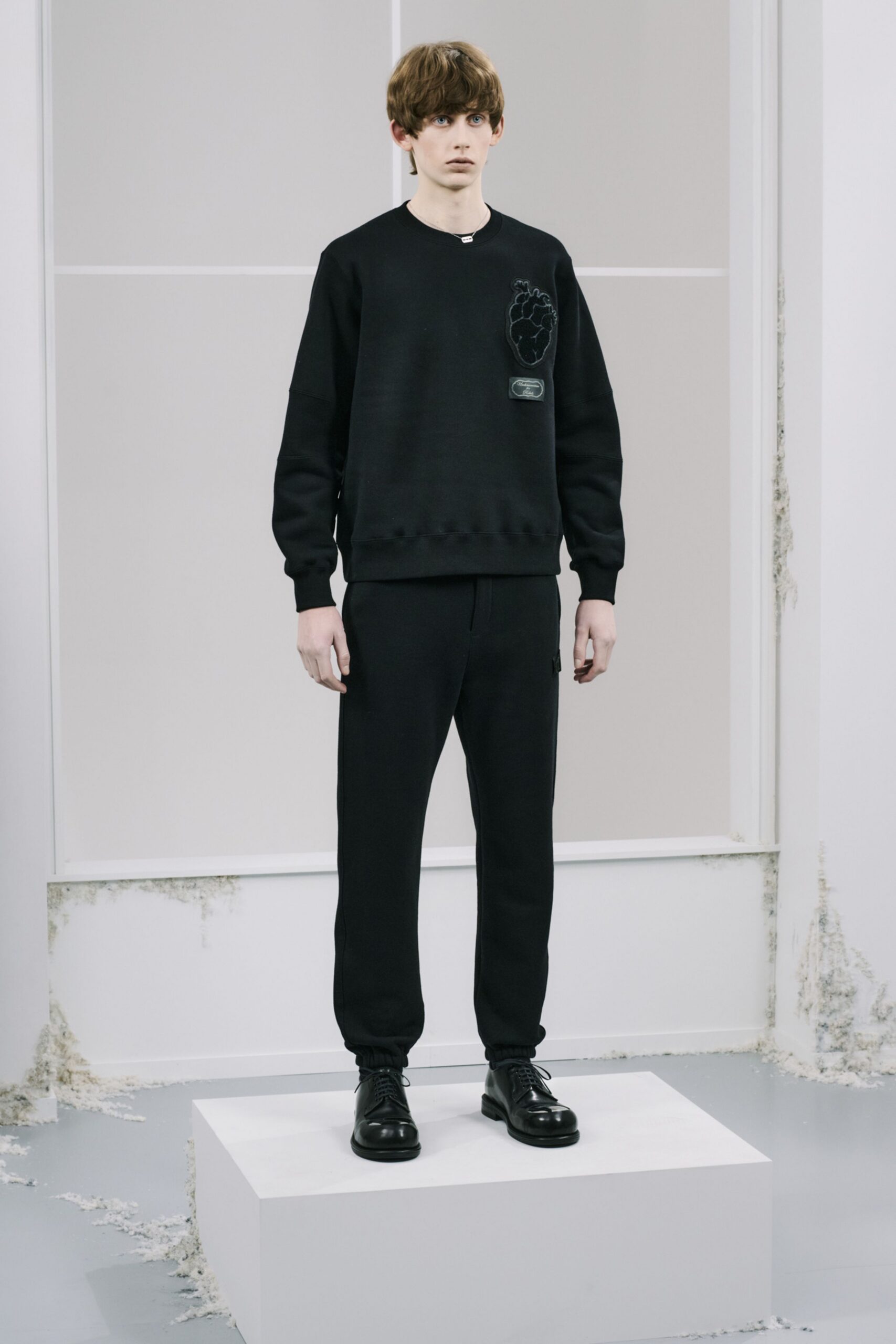 black relaxed sweater and pants