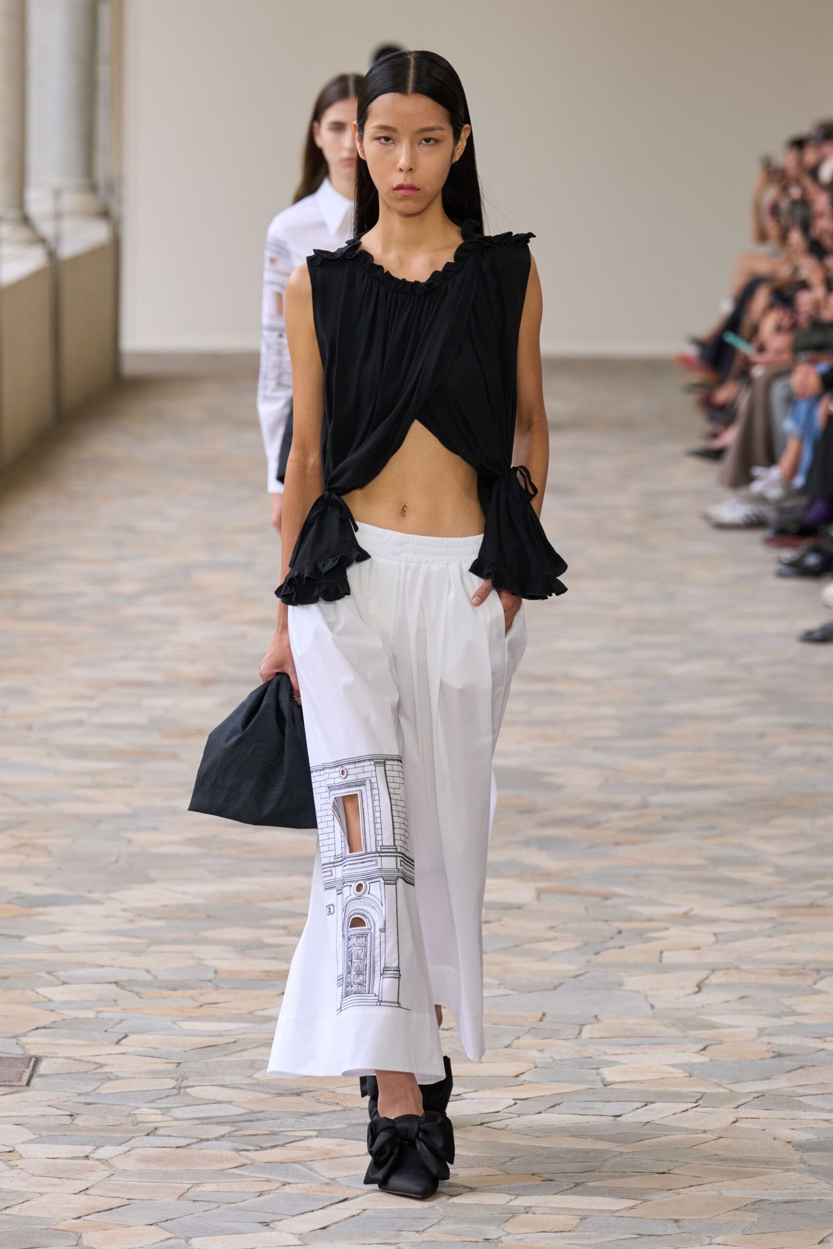 black fitted top with ruffles
