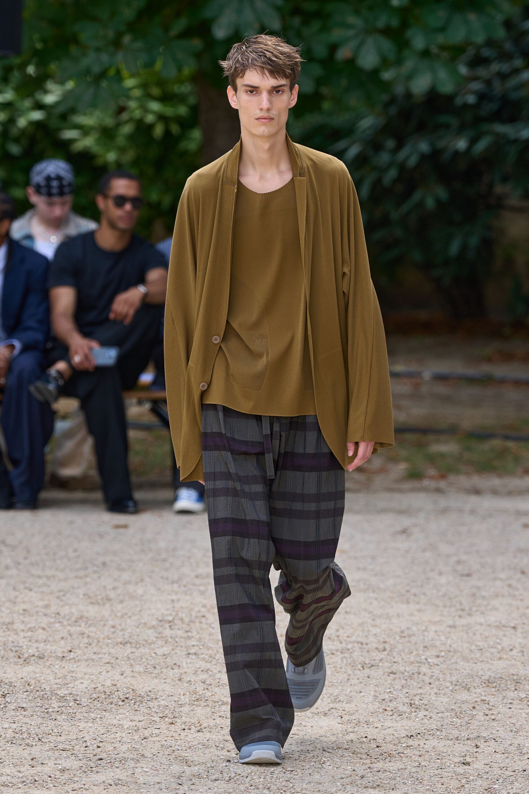 brown relaxed top with checked pants