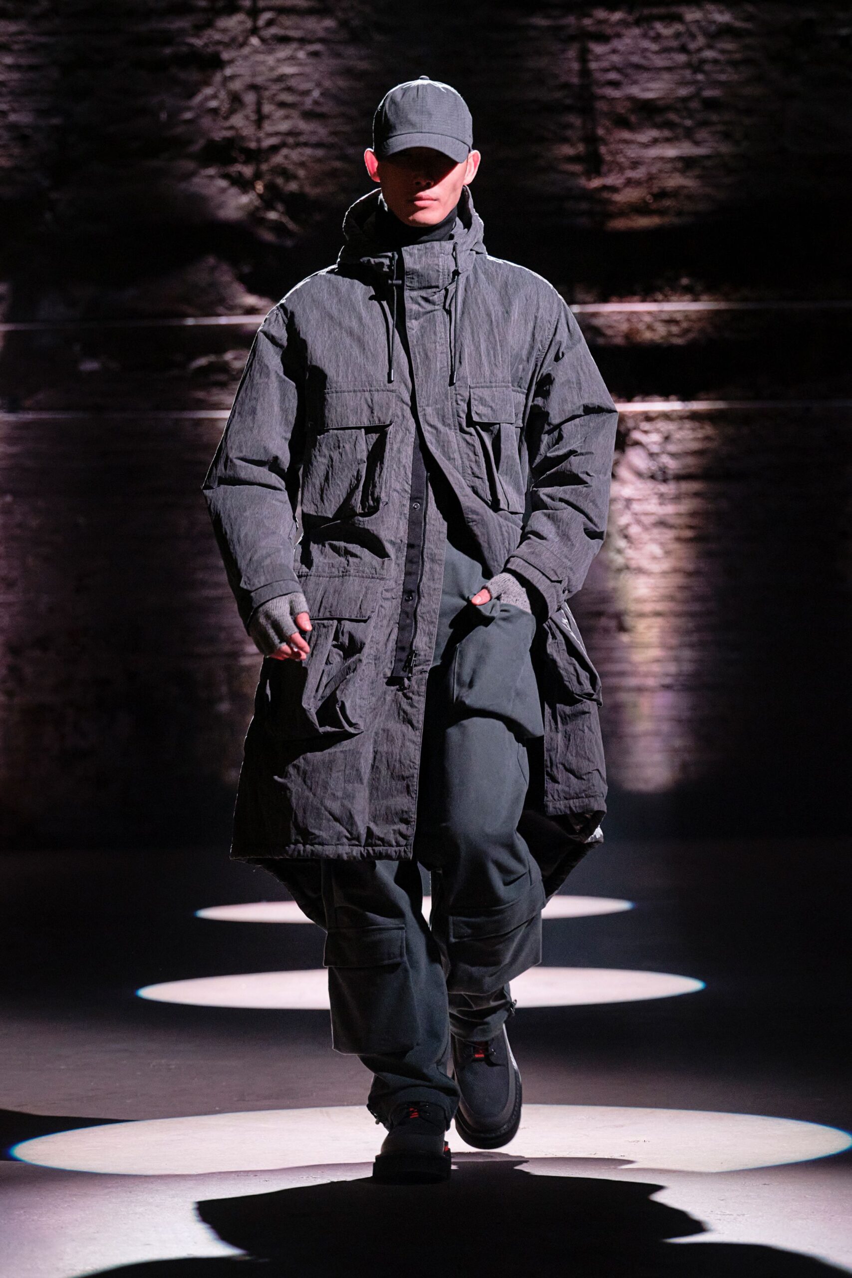 black cotton long-sleeve collared relaxed zippered pockets coat