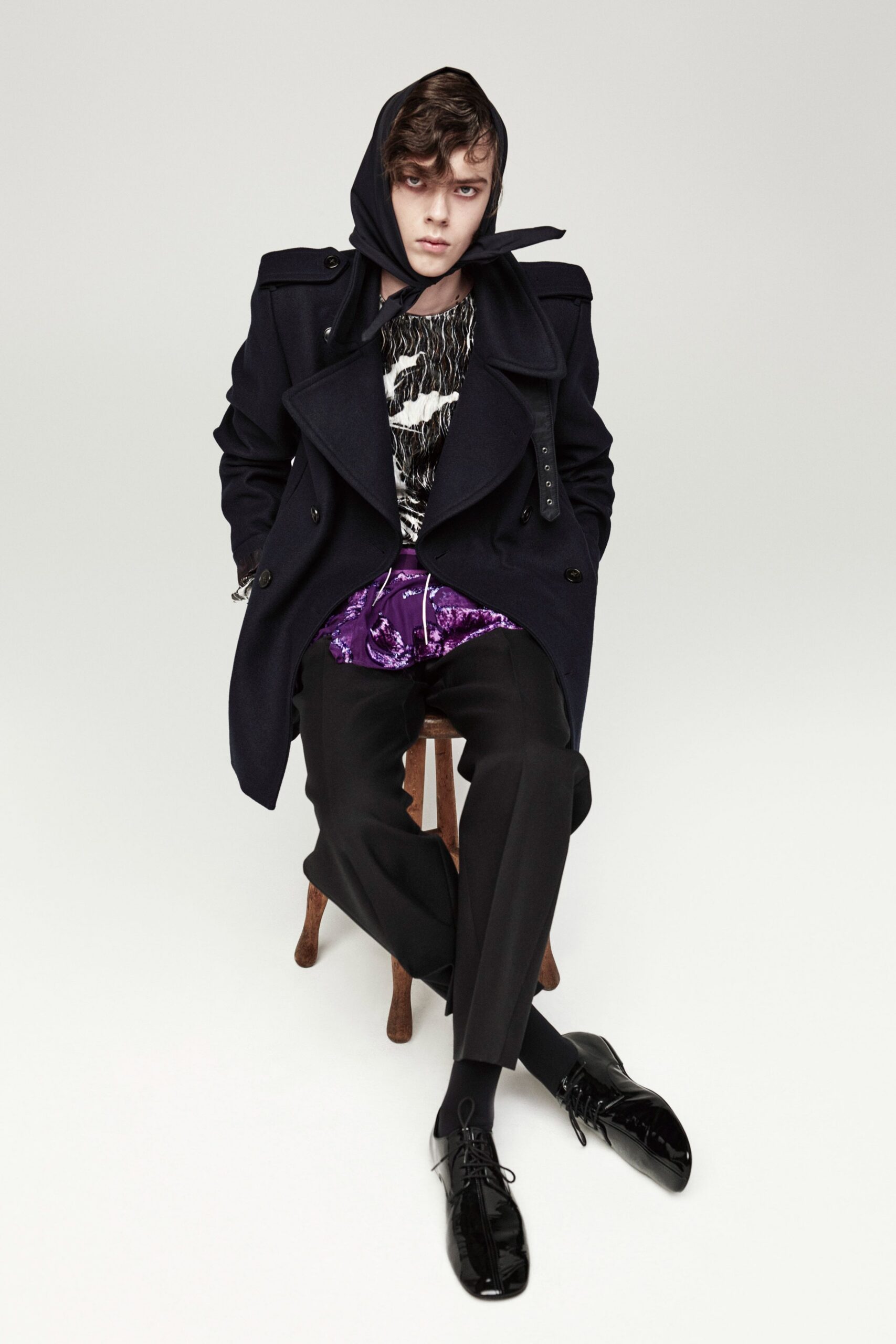 black wool coat with purple shirt