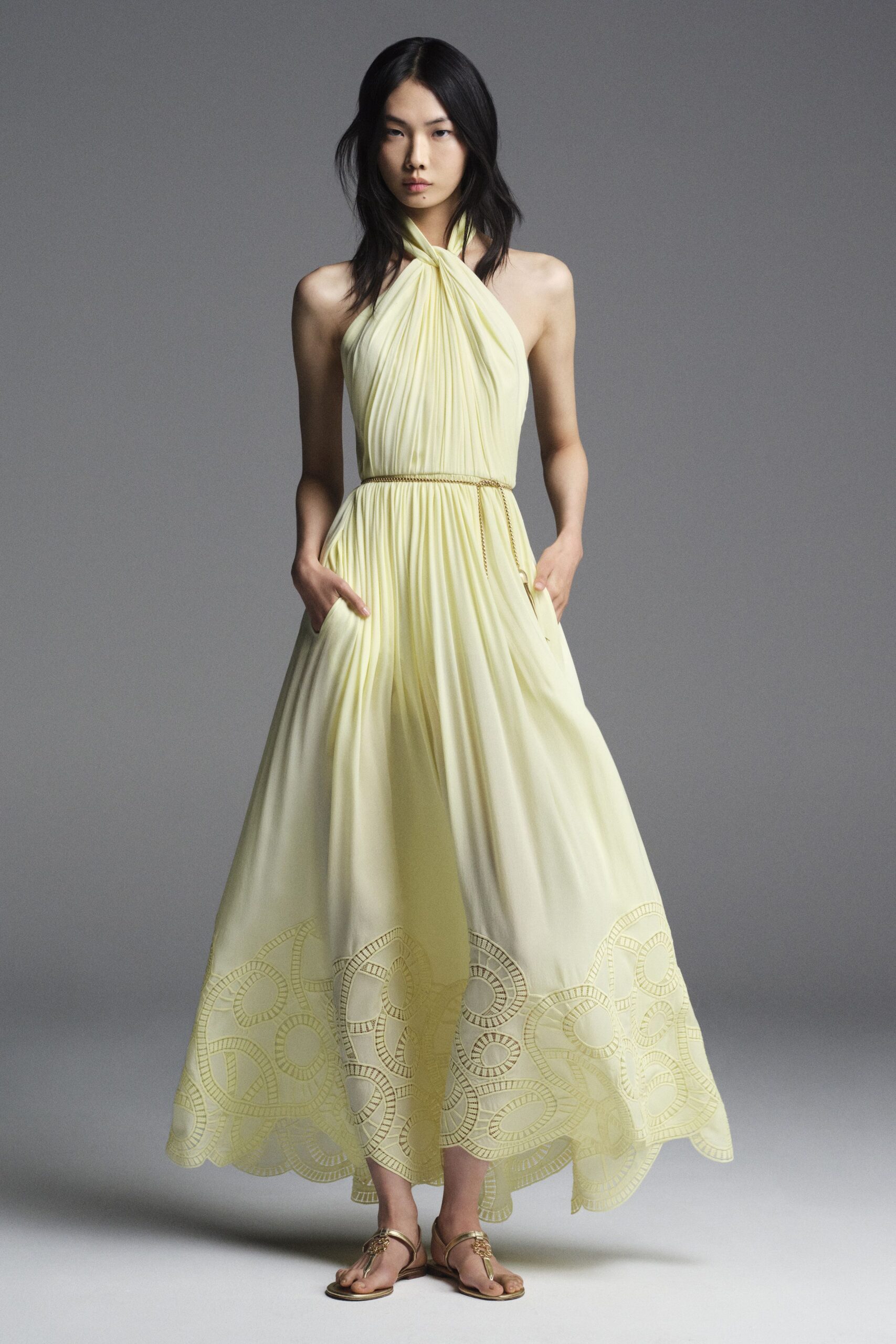 yellow silk sleeveless halter fitted pleated embroidered gown