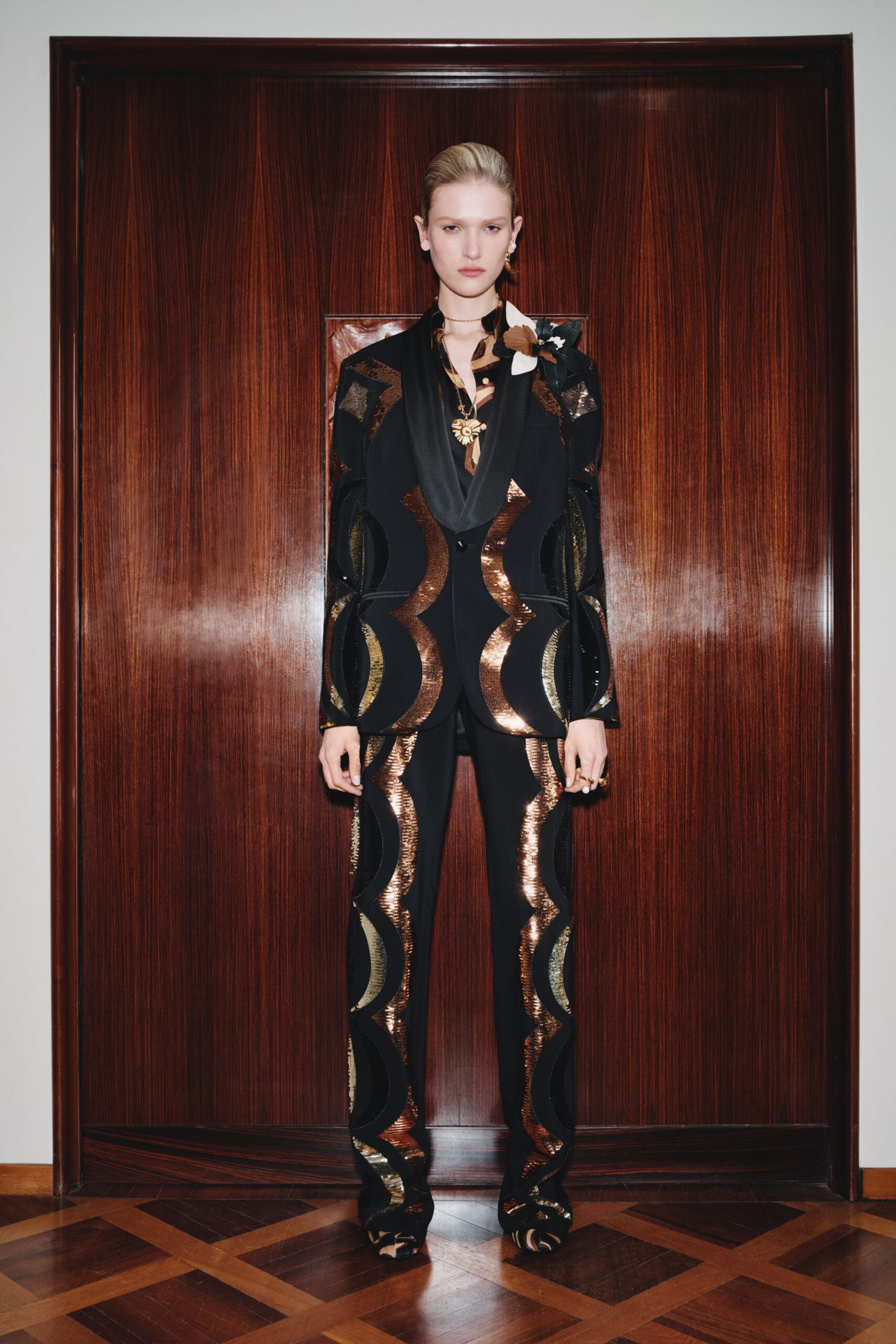 black and gold embellished suit