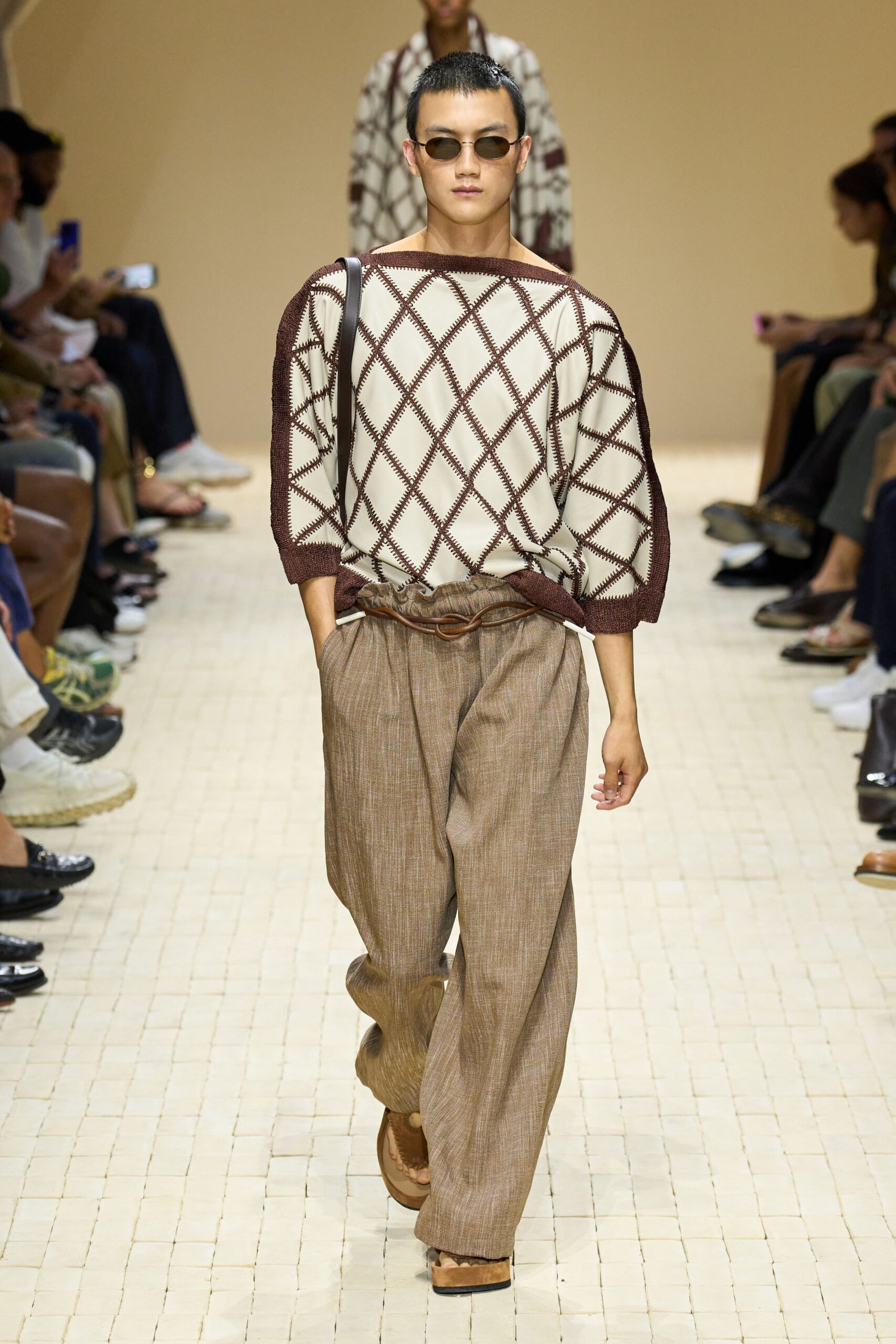 relaxed white embroidered top with brown pants