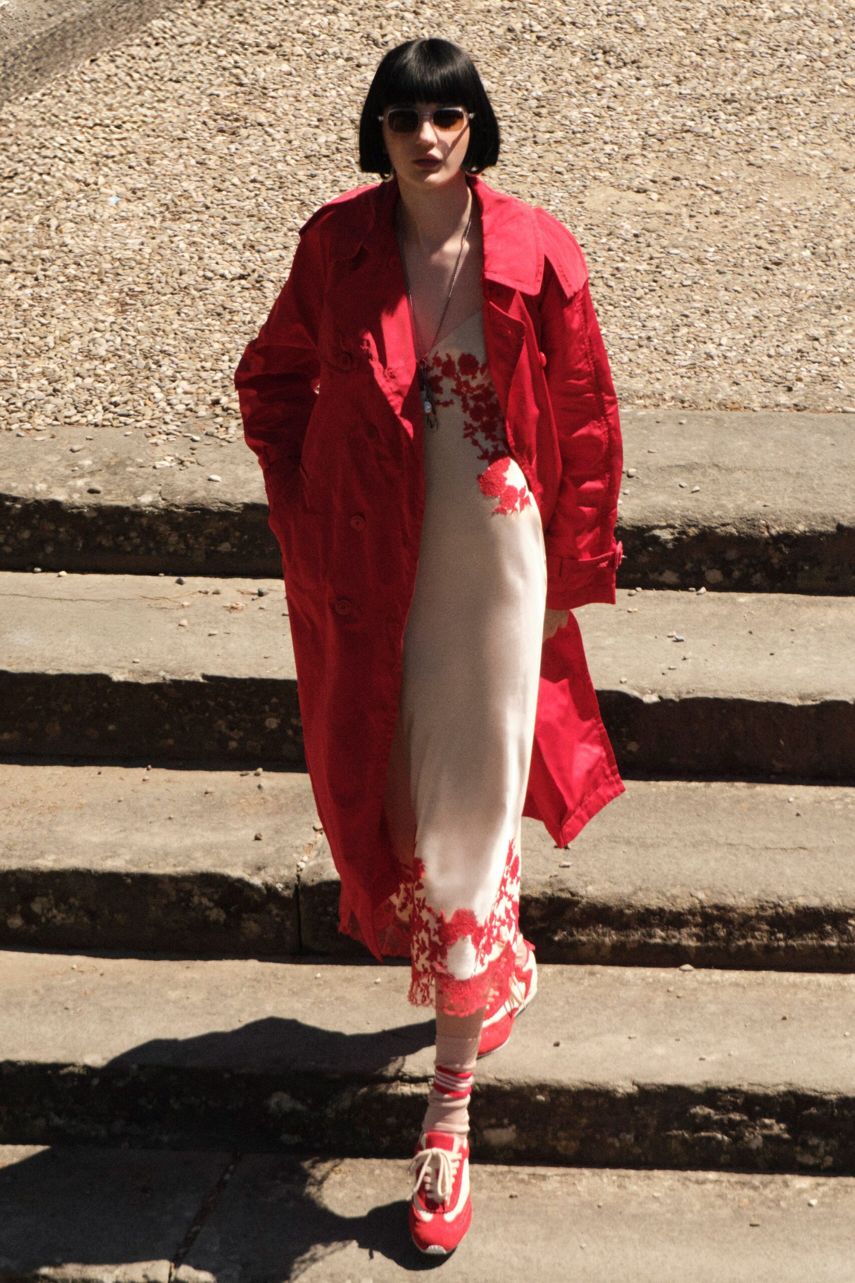 red oversized coat with floral dress