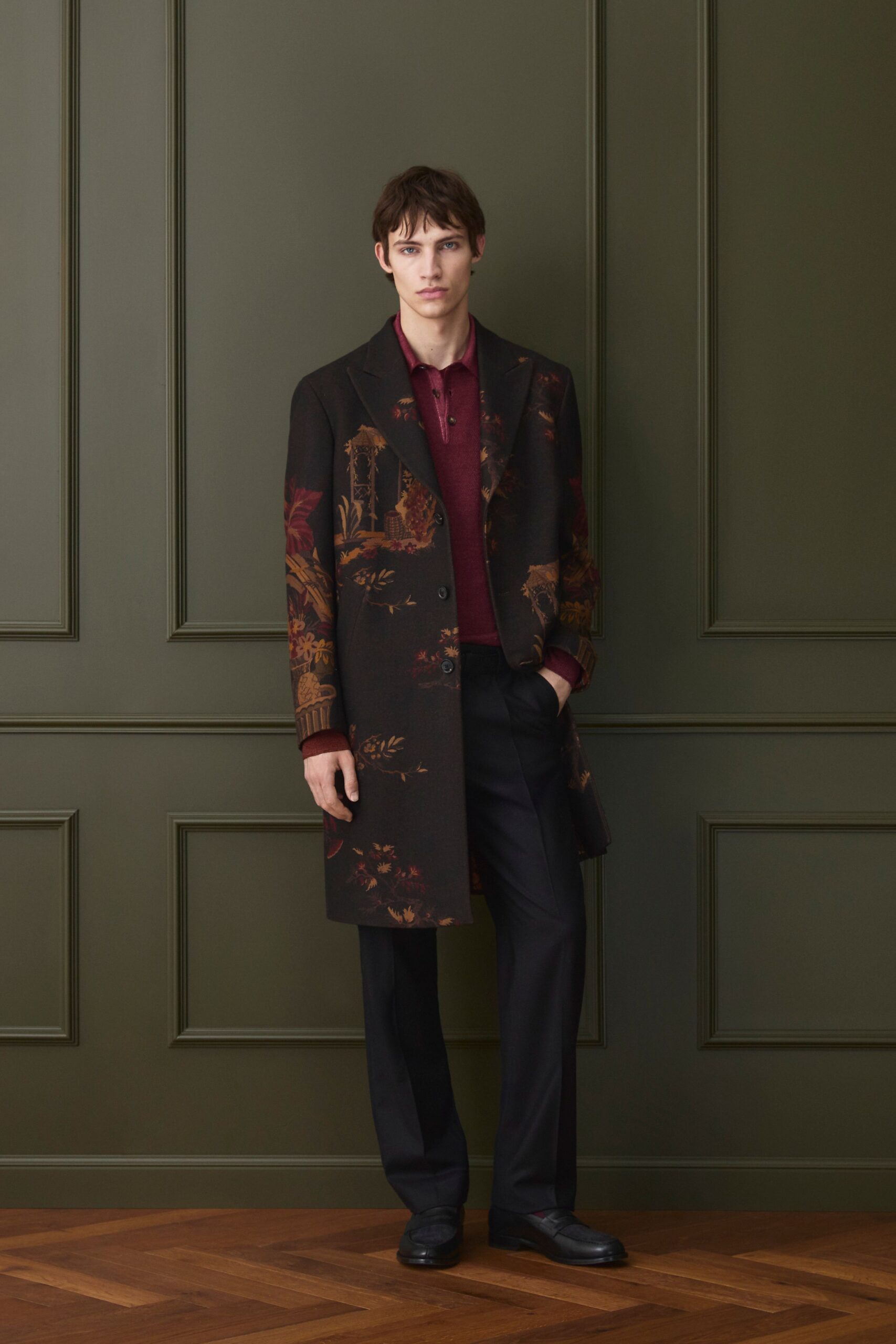 embroidered black coat with red shirt