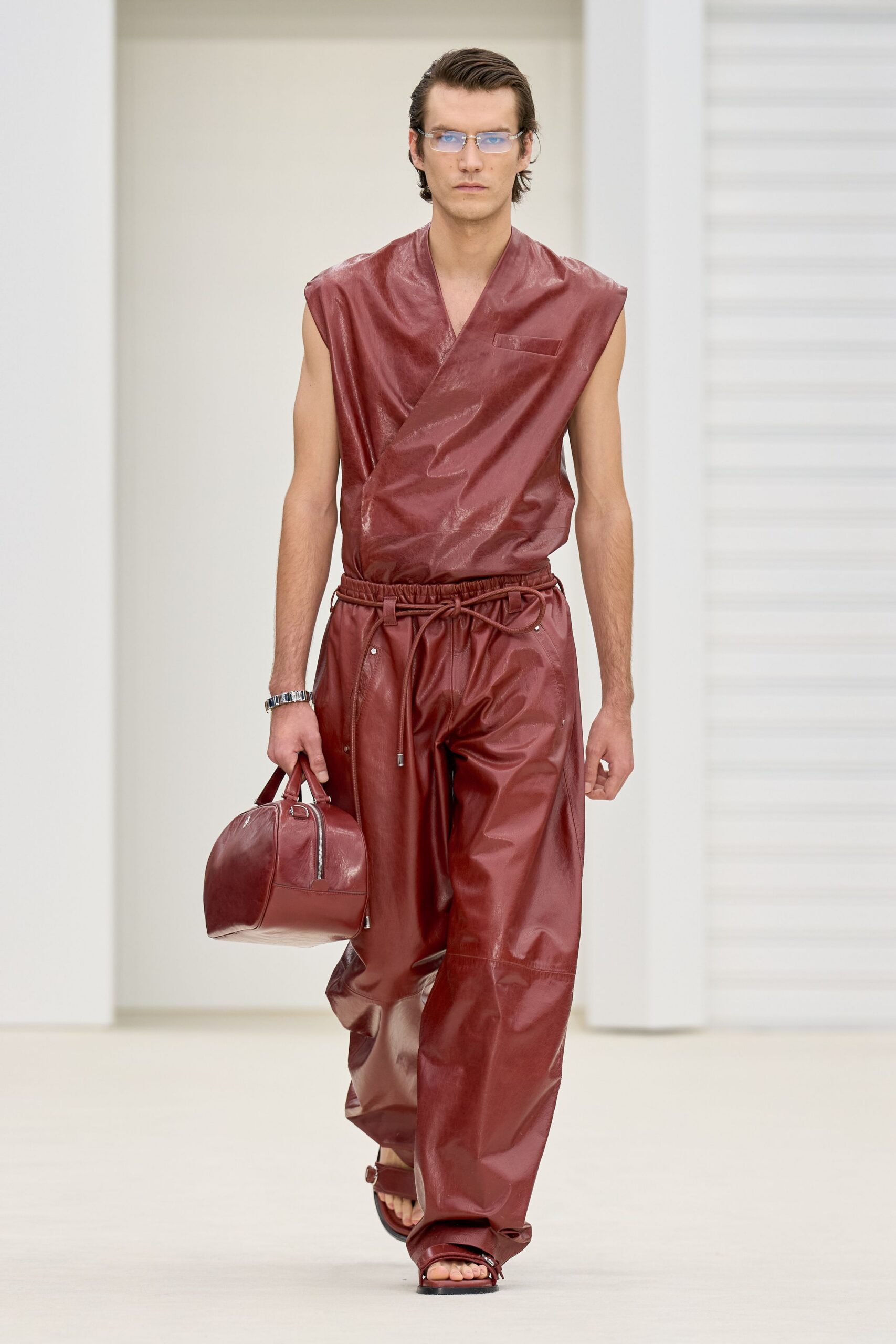 red leather sleeveless v-neck fitted zippered jumpsuit