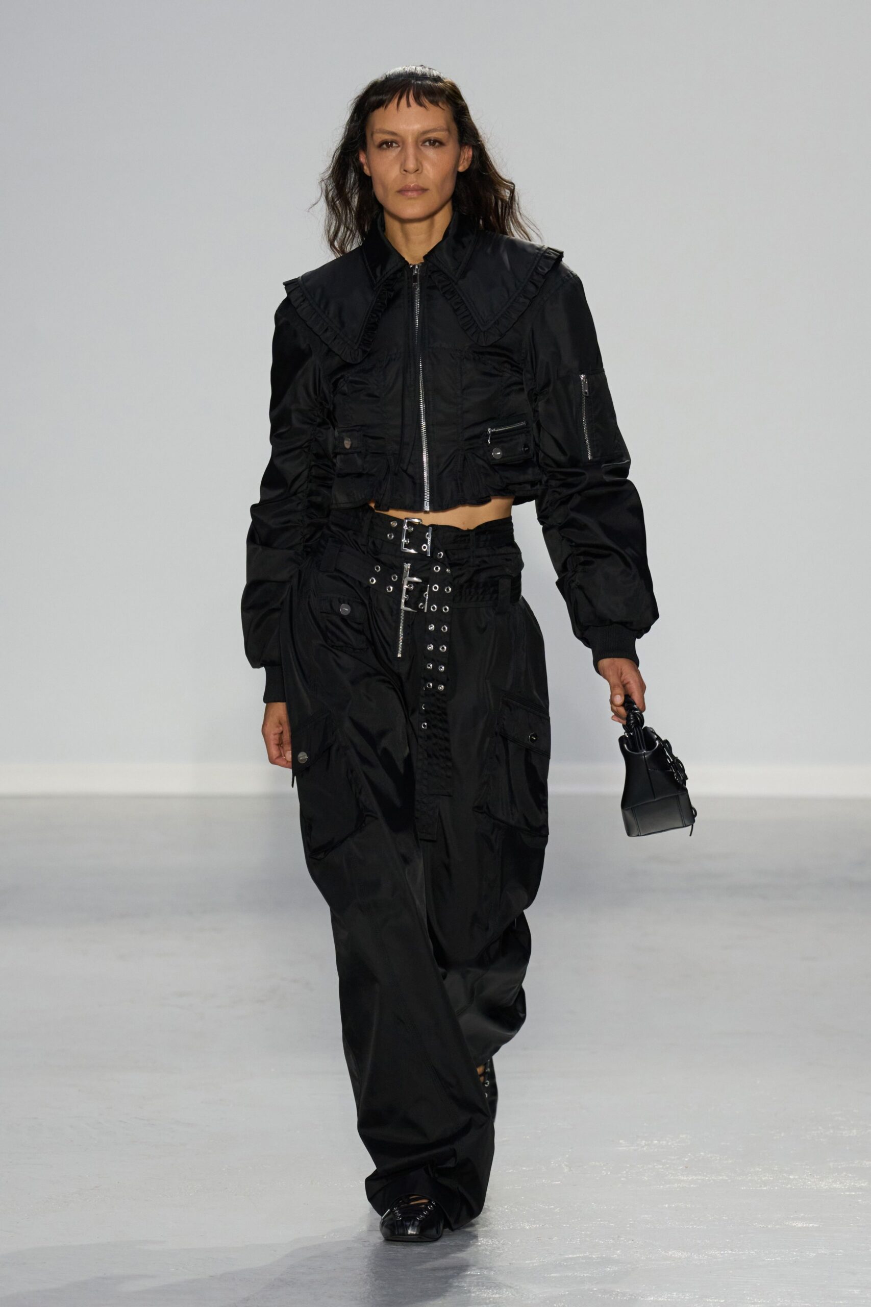 black fitted jacket and relaxed pants
