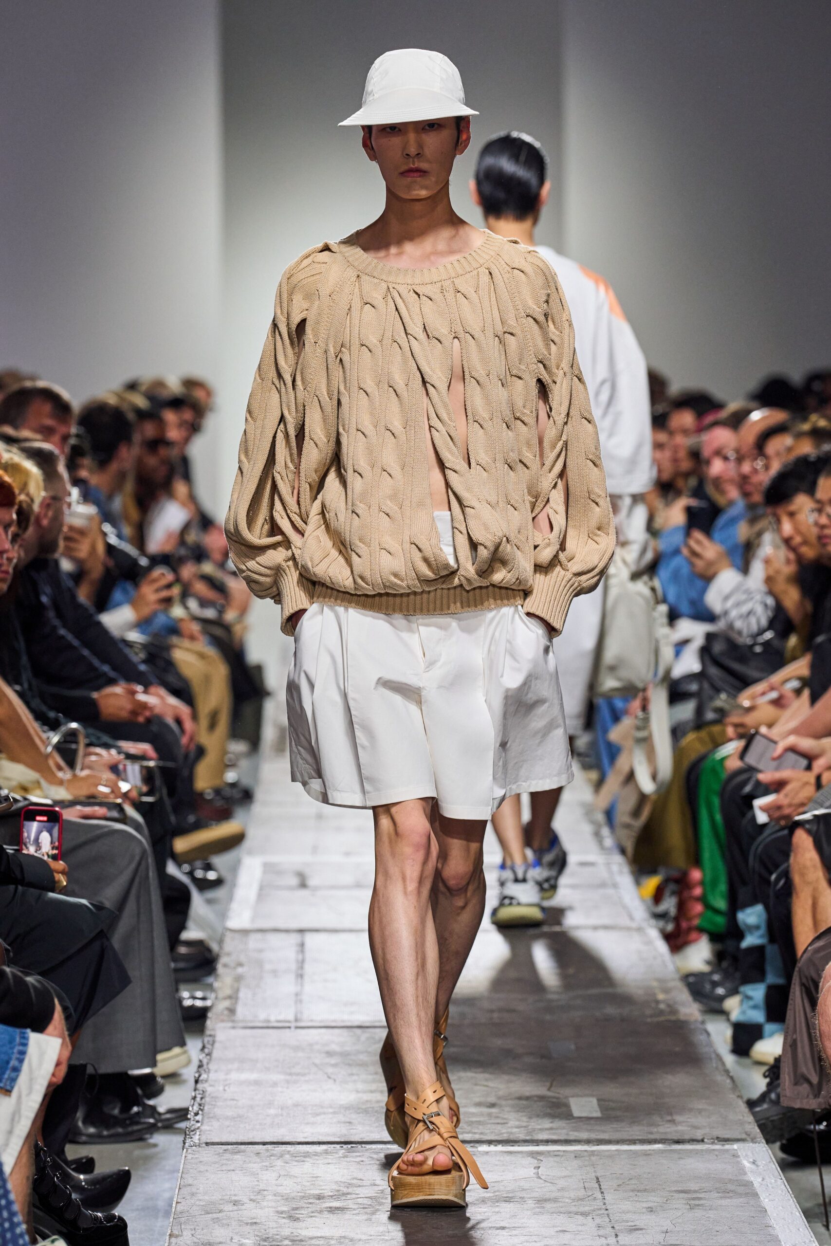 beige relaxed sweater with white shorts