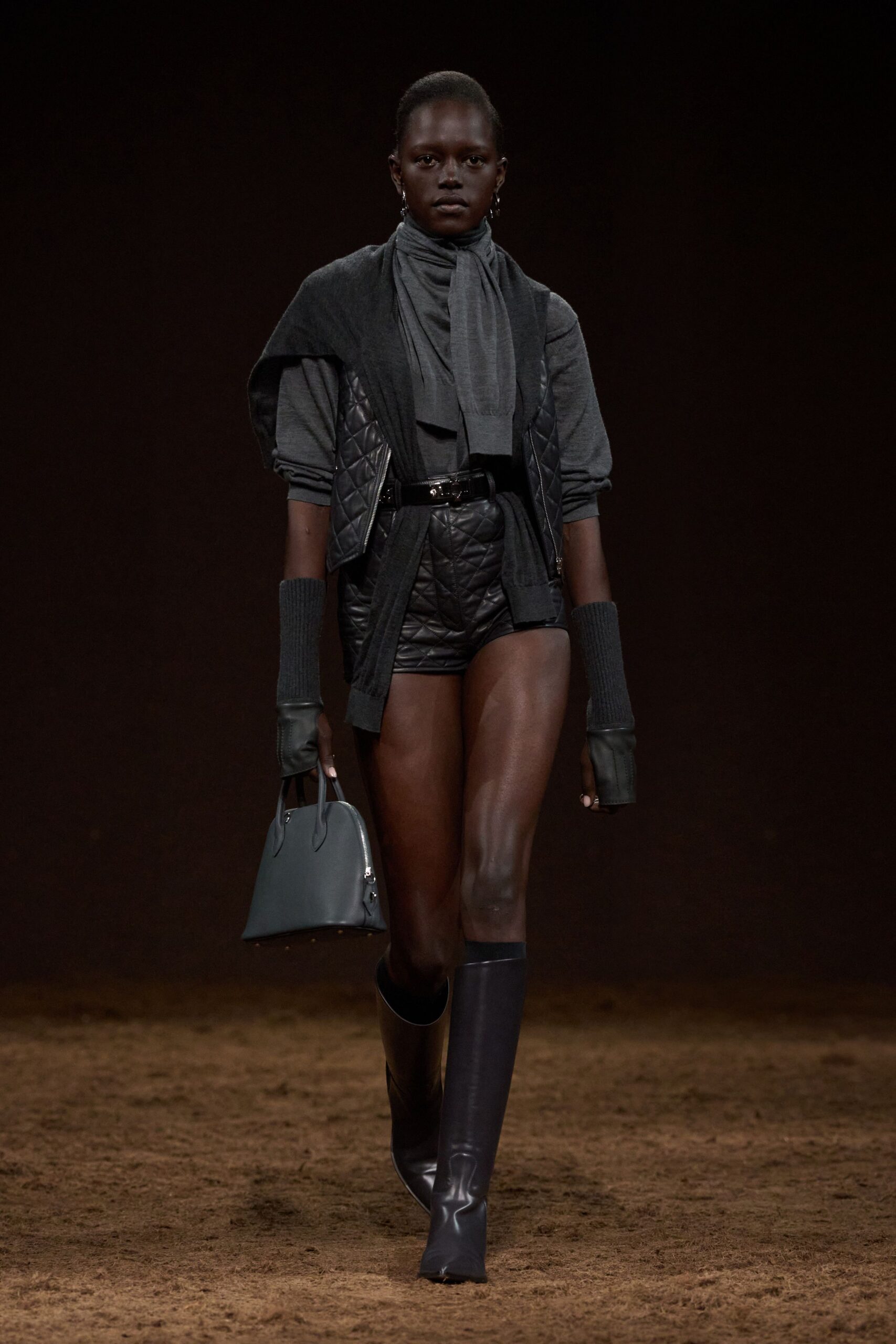 gray fitted top with black shorts