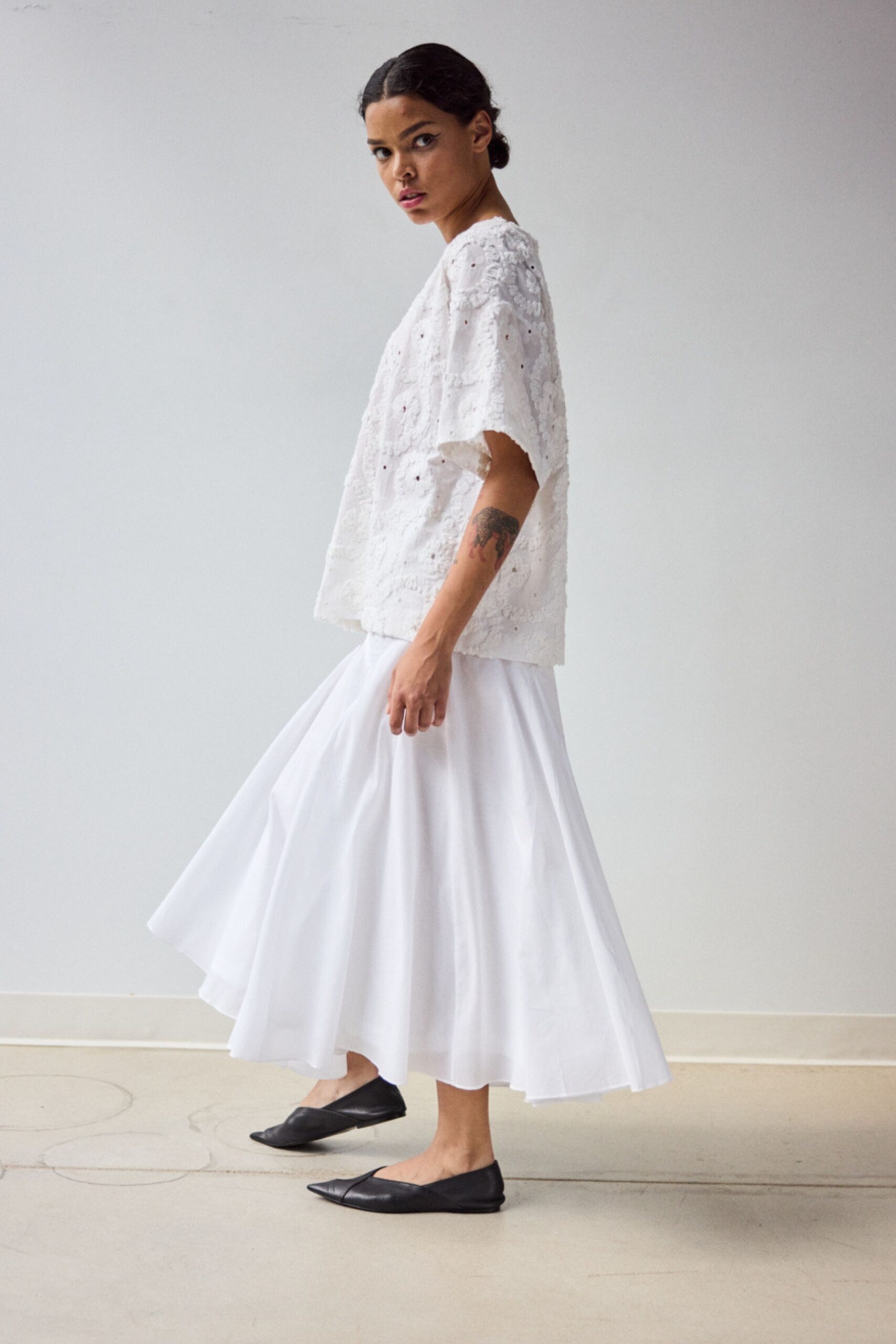 white cotton fitted tiered flared midi skirt