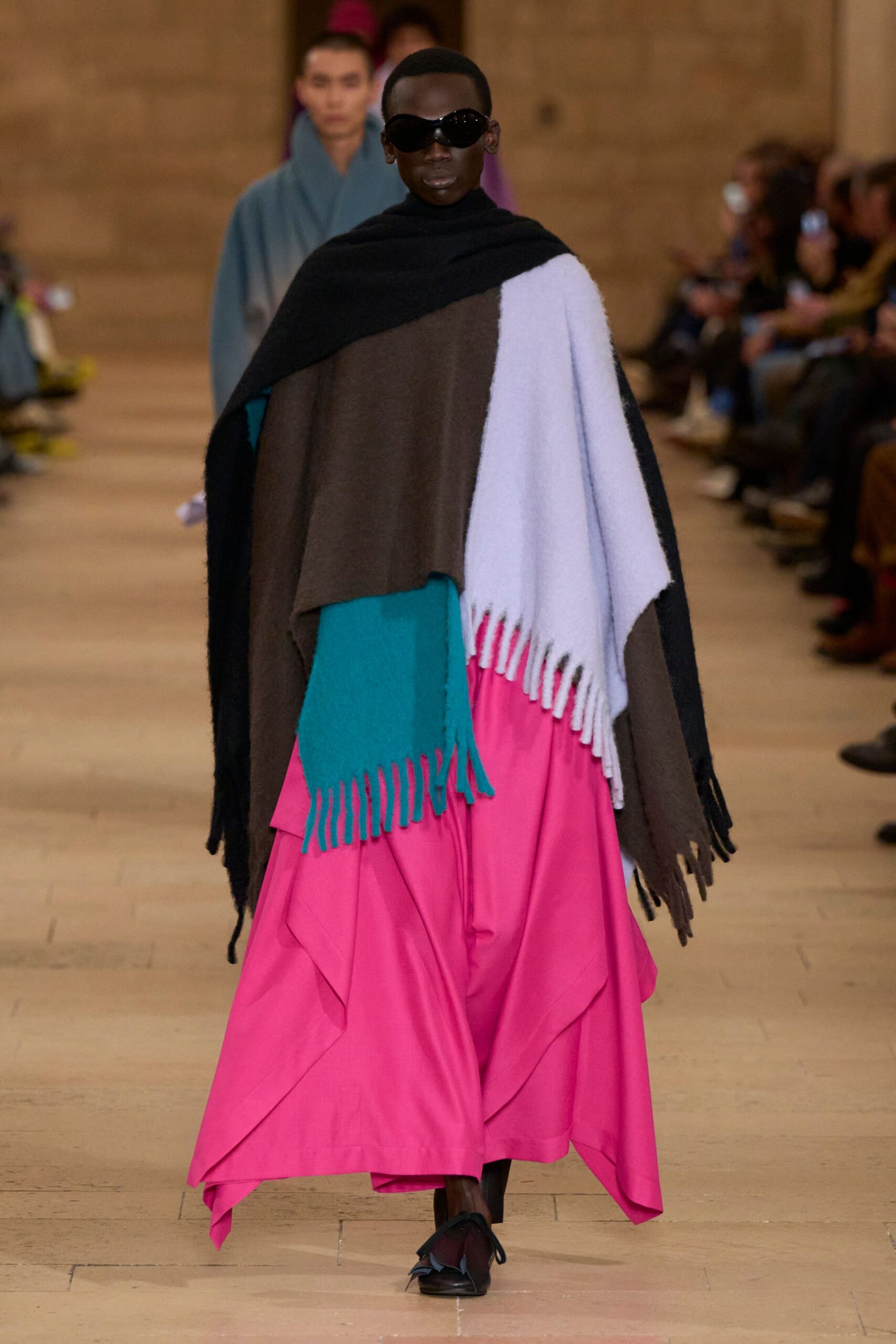 colorful cape and pink skirt