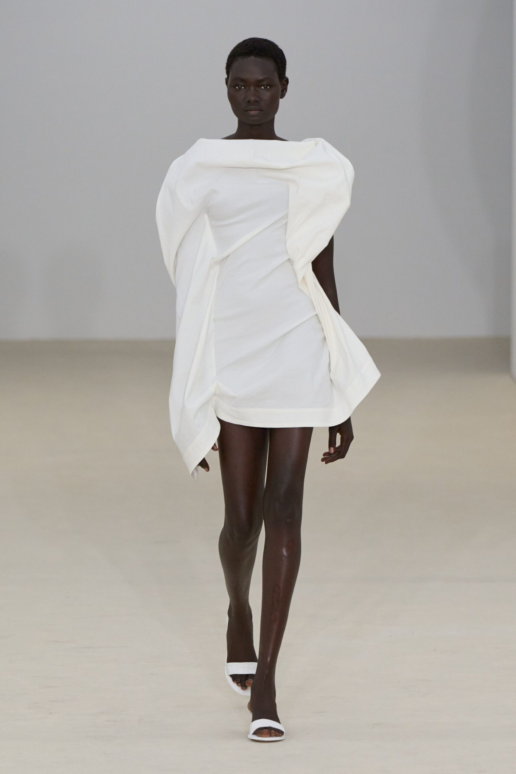 white cotton sleeveless off-shoulder fitted draped mini dress