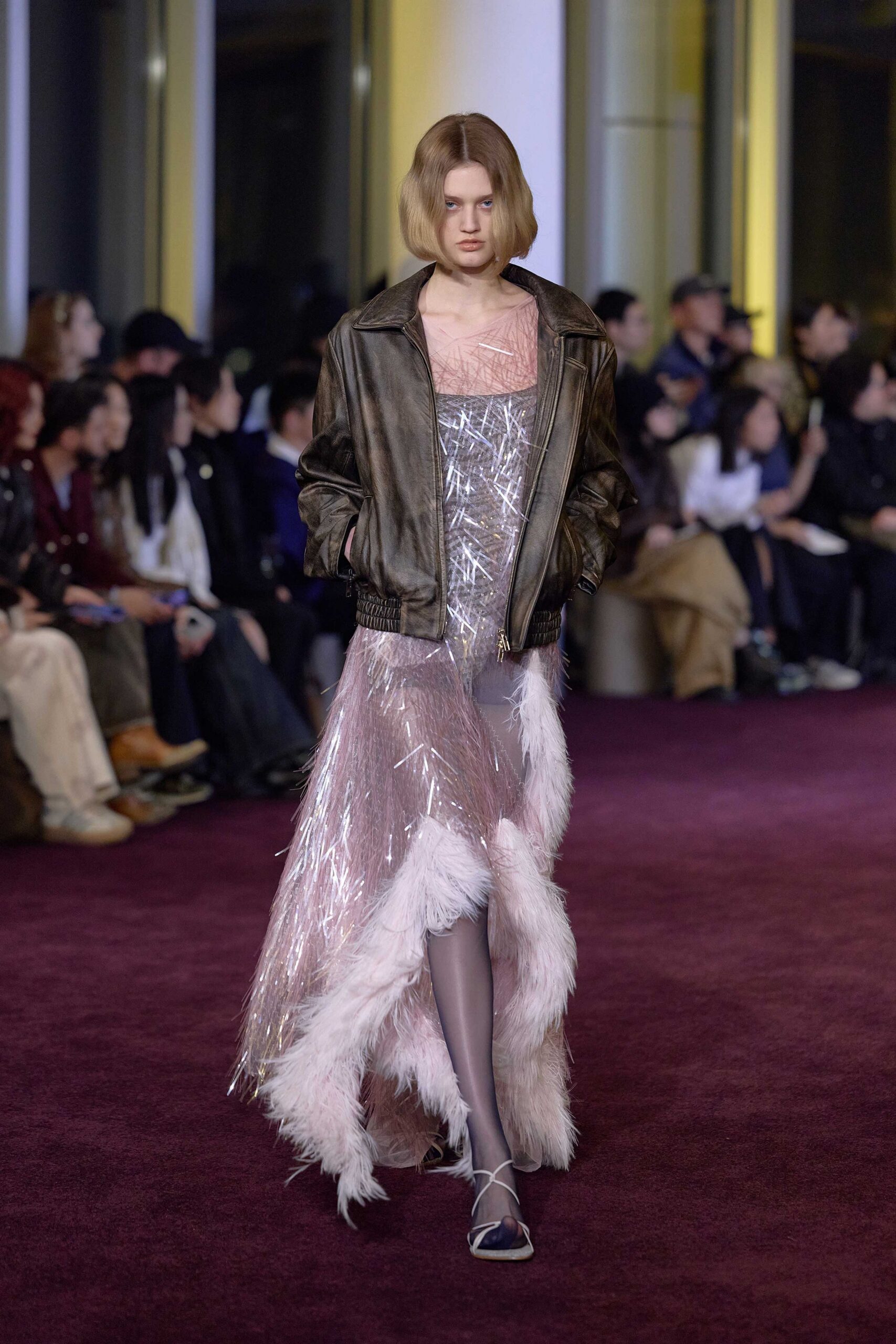 pink silk layered dress with black leather jacket