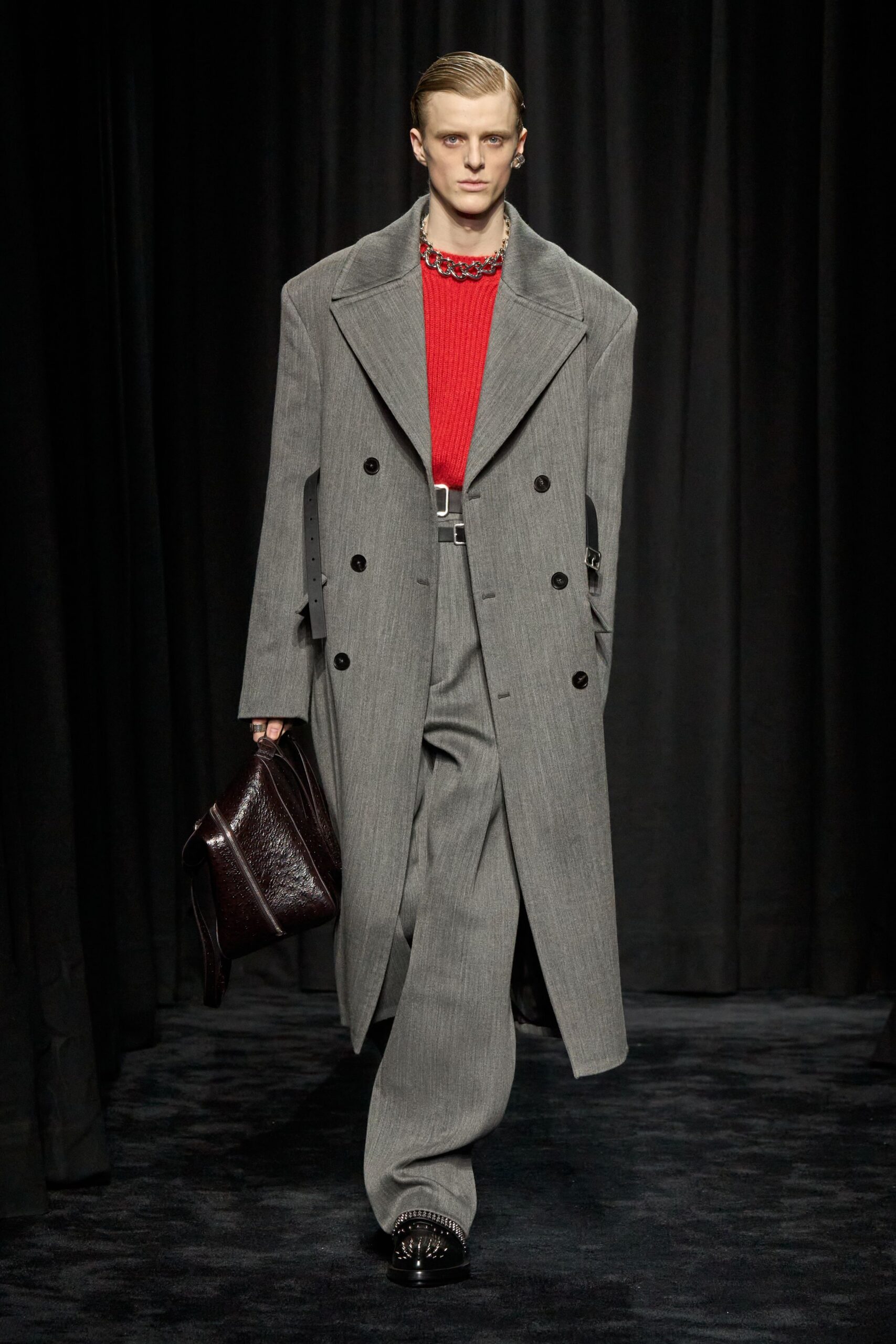 gray oversized coat with red sweater