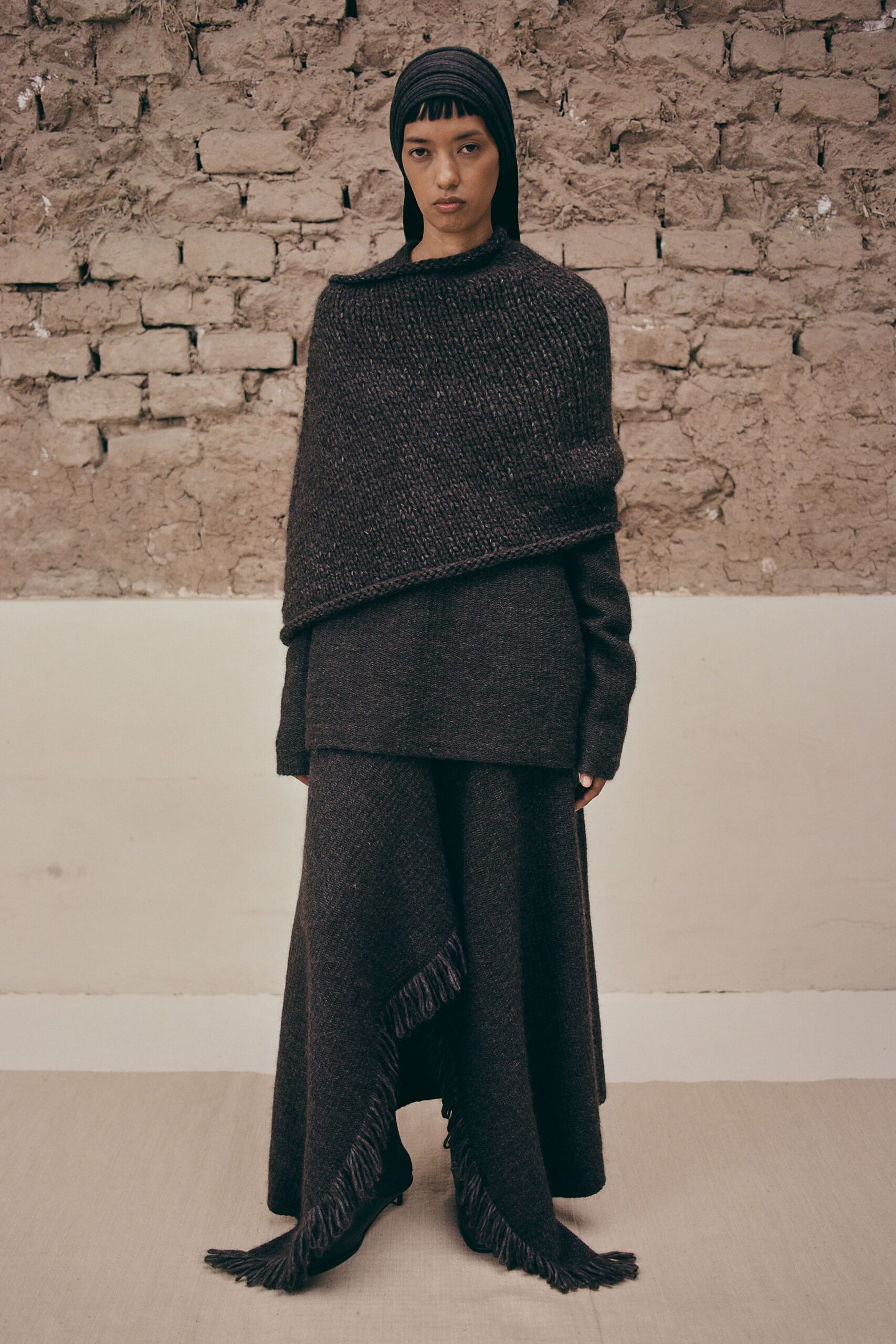 black wool asymmetric relaxed fringed skirt