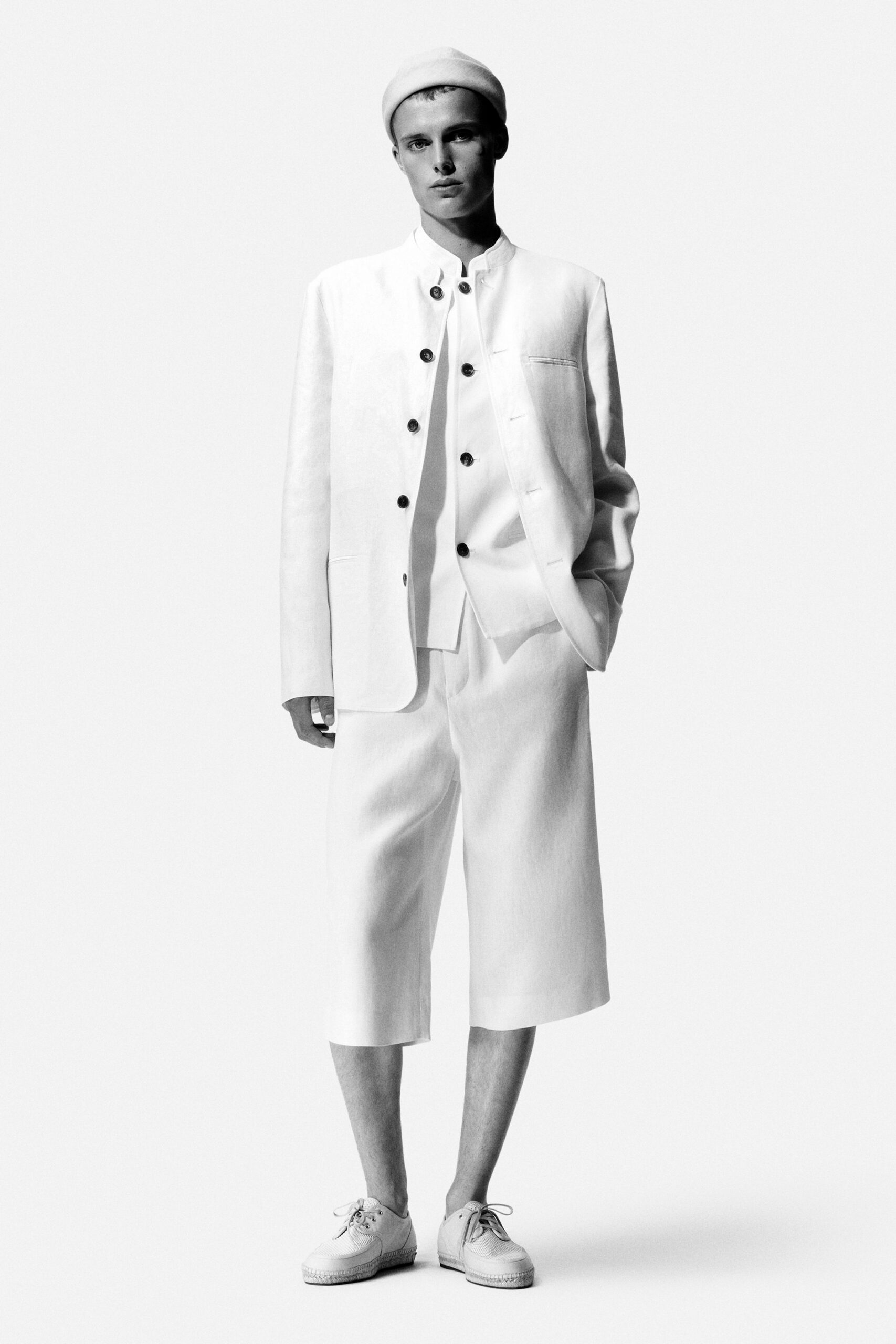 white cotton long-sleeve collared structured buttoned jacket