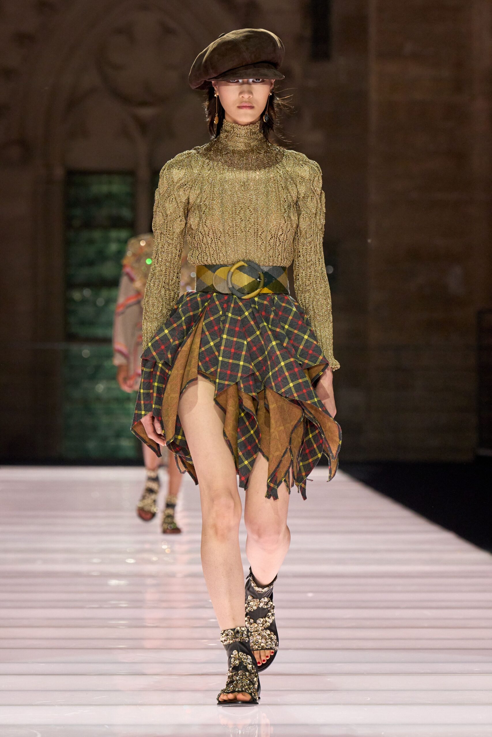 gold knit turtleneck top with mini skirt