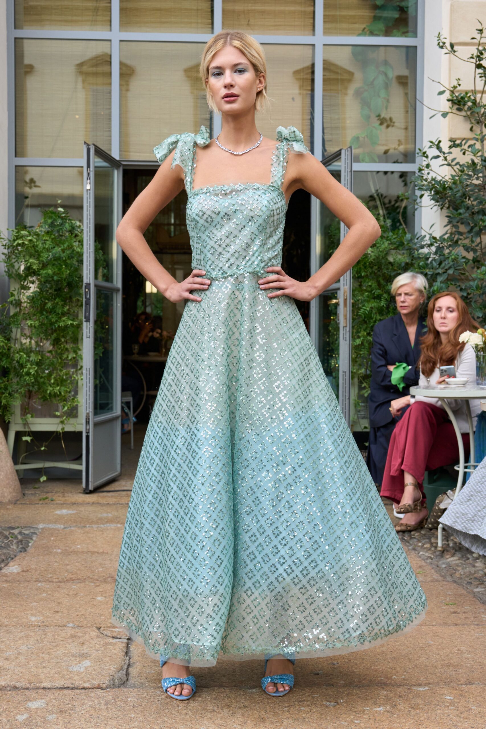 blue sequined sleeveless gown