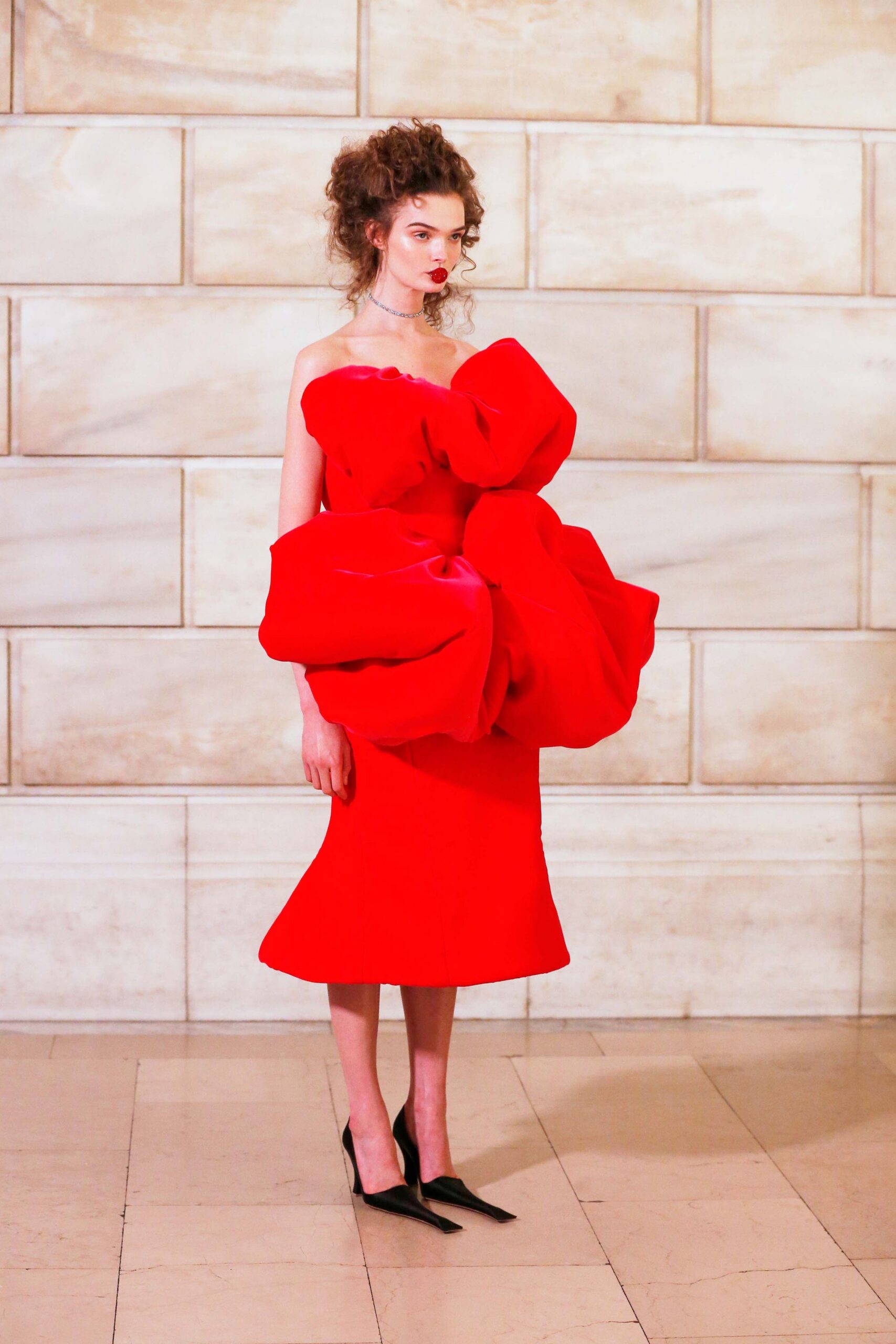 red silk strapless fitted draped midi dress