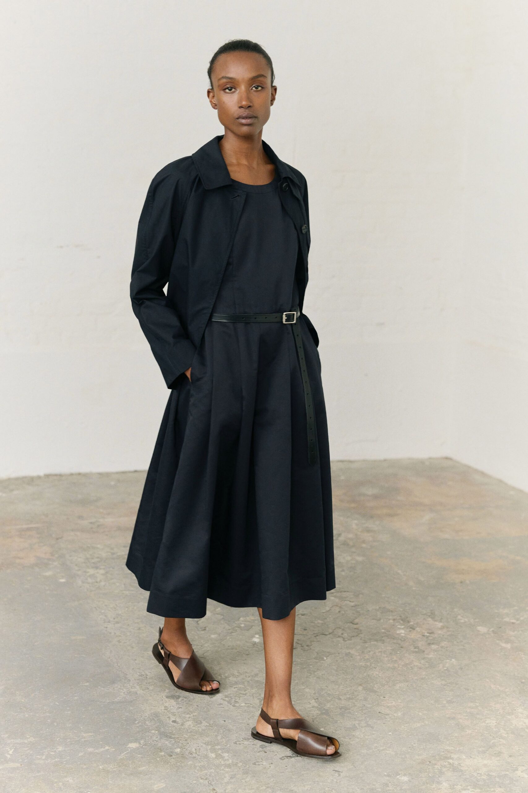 black cotton sleeveless v-neck fitted a-line belted dress