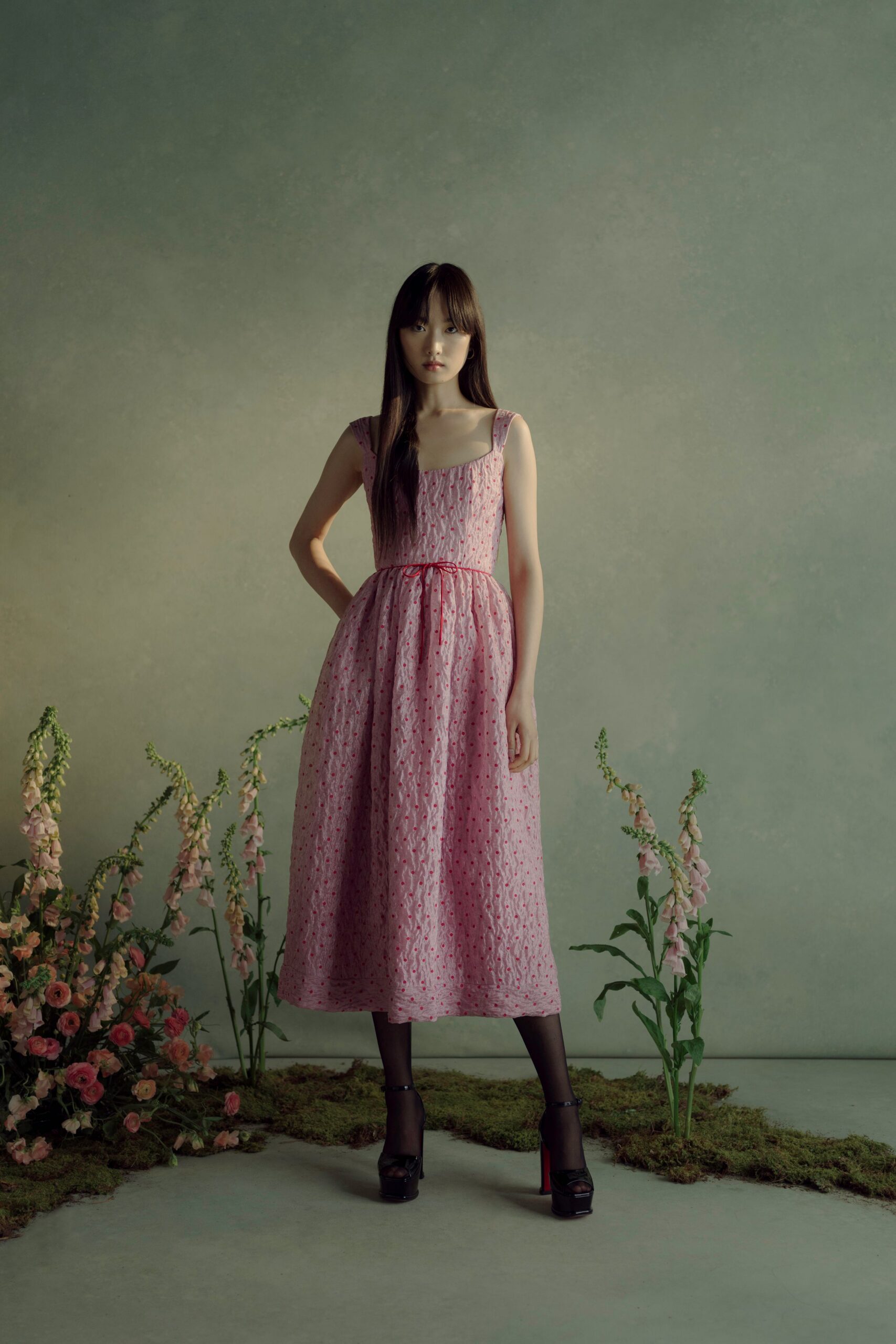 pink pleated midi dress with heels