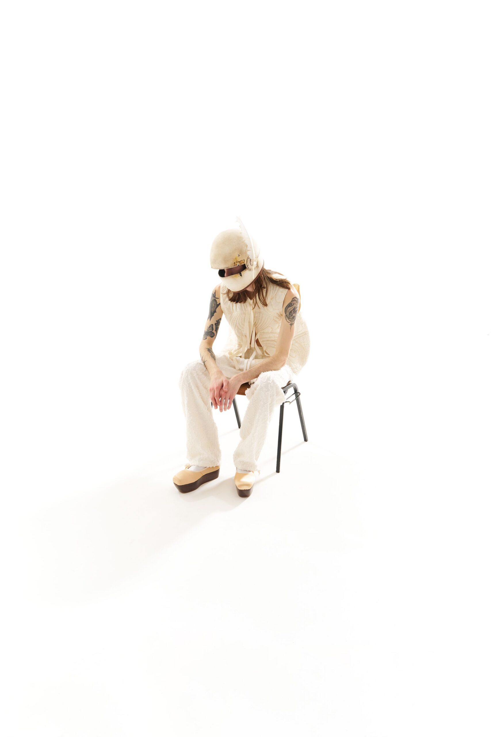 beige fringed hat