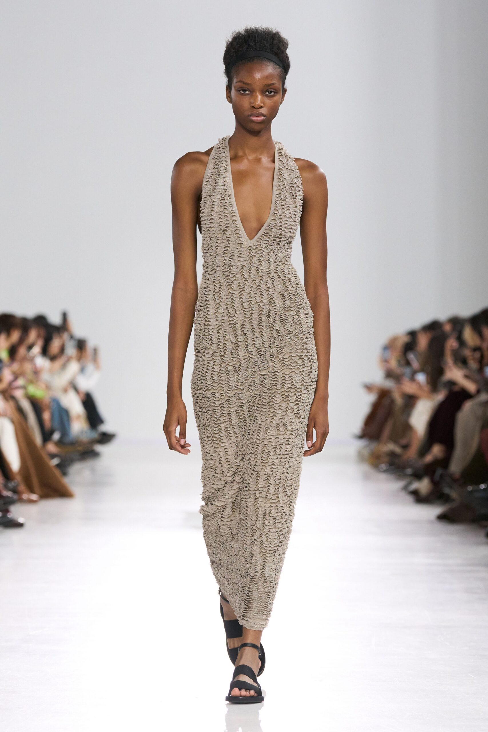 beige ruched midi dress with black shoes