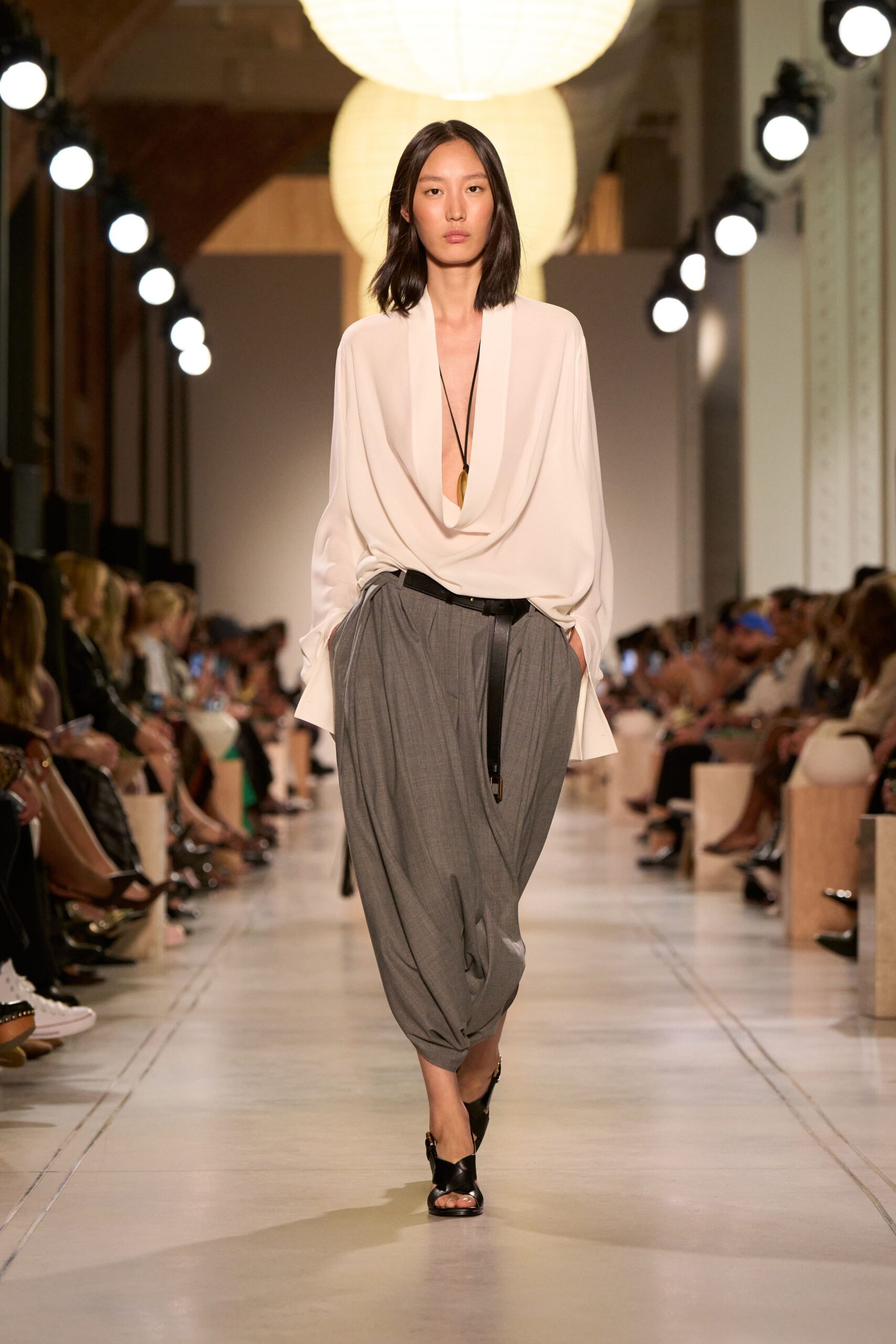 white silk blouse gray pants