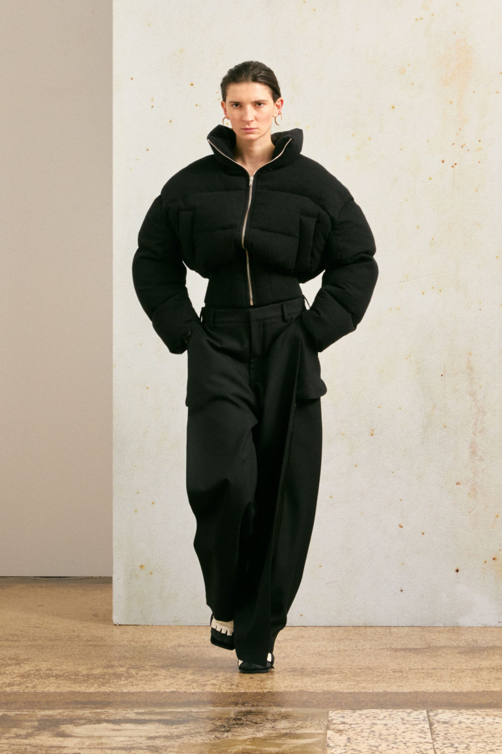 black fitted jacket with relaxed pants