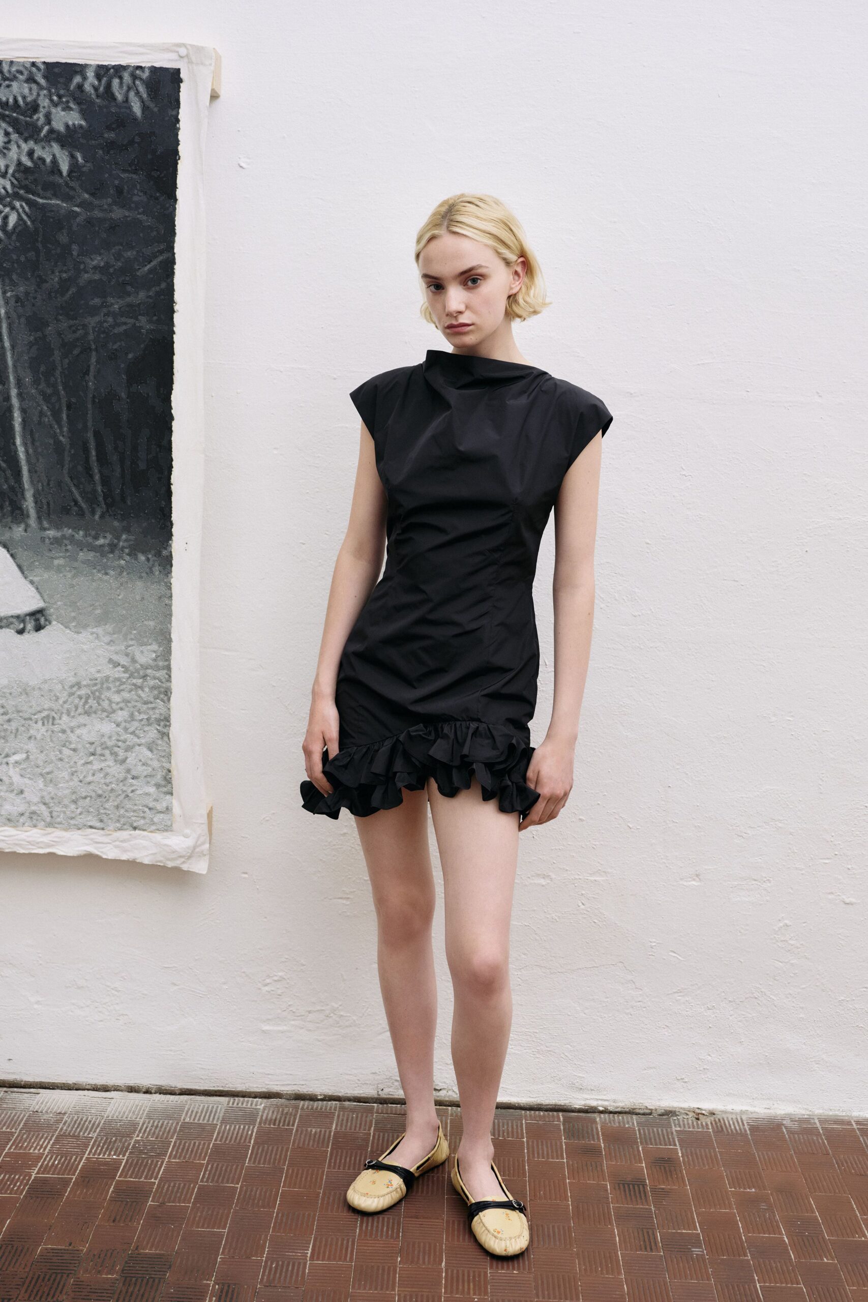 black fitted mini dress