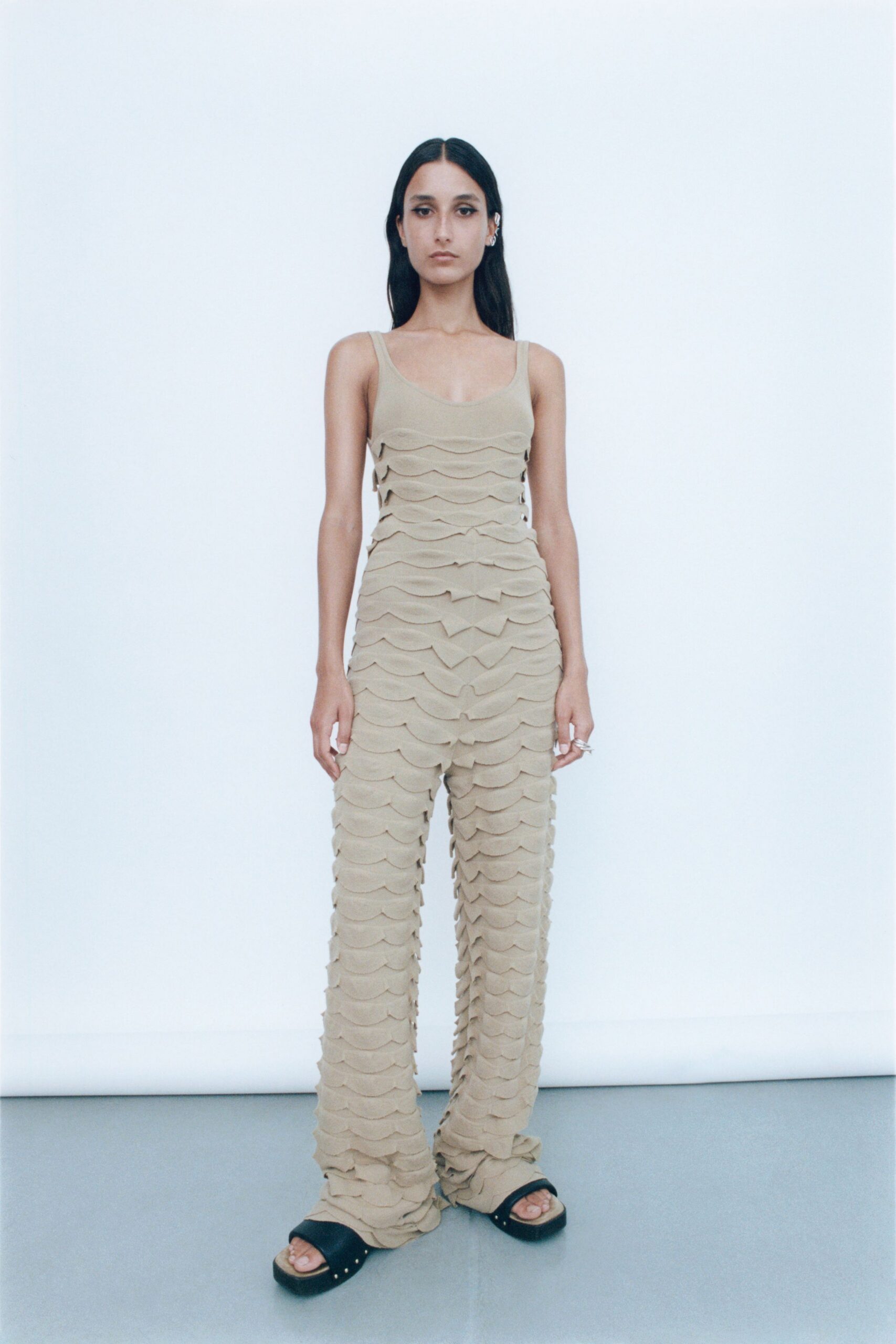 beige cotton sleeveless v-neck fitted layered jumpsuit
