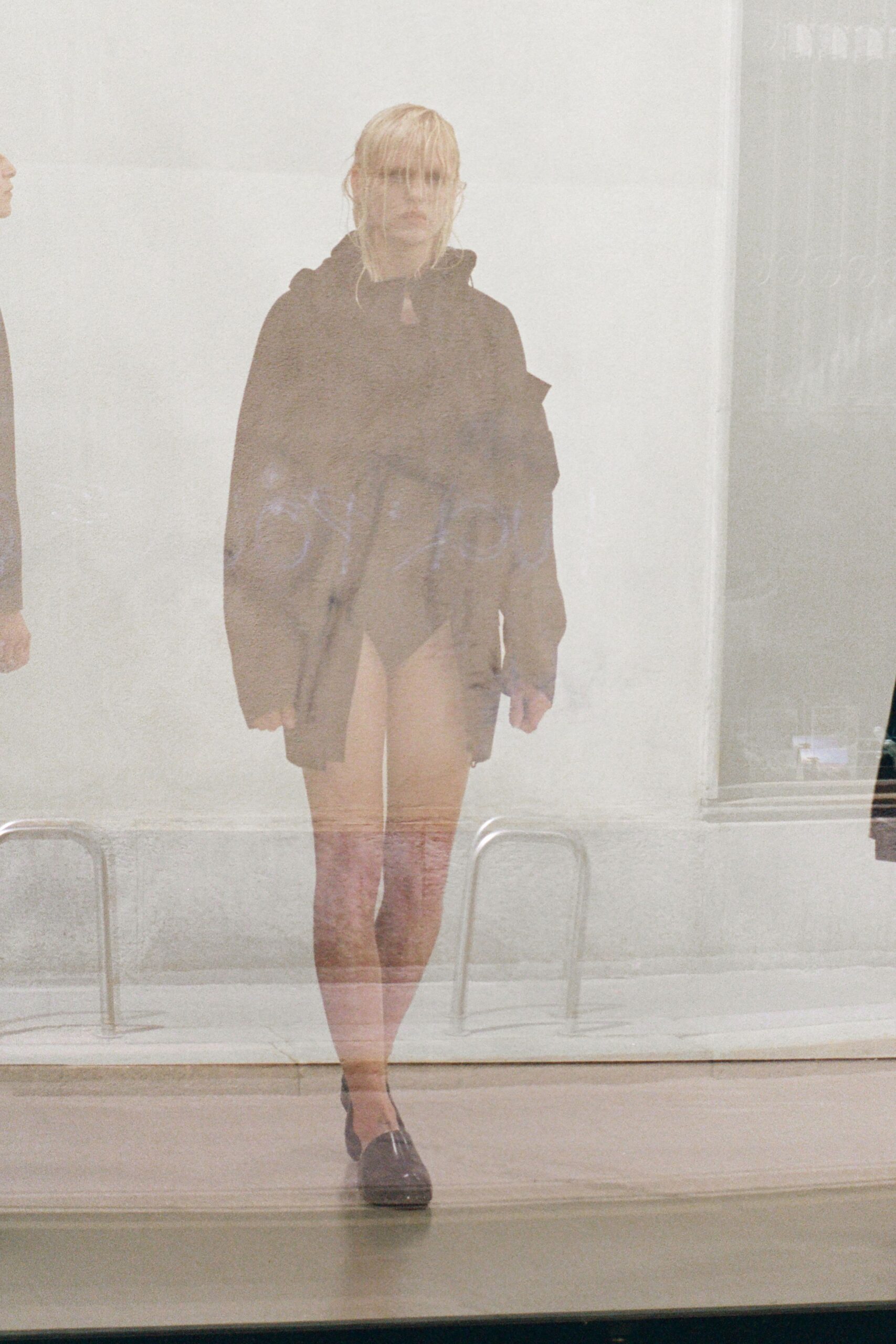 black coat and bodysuit