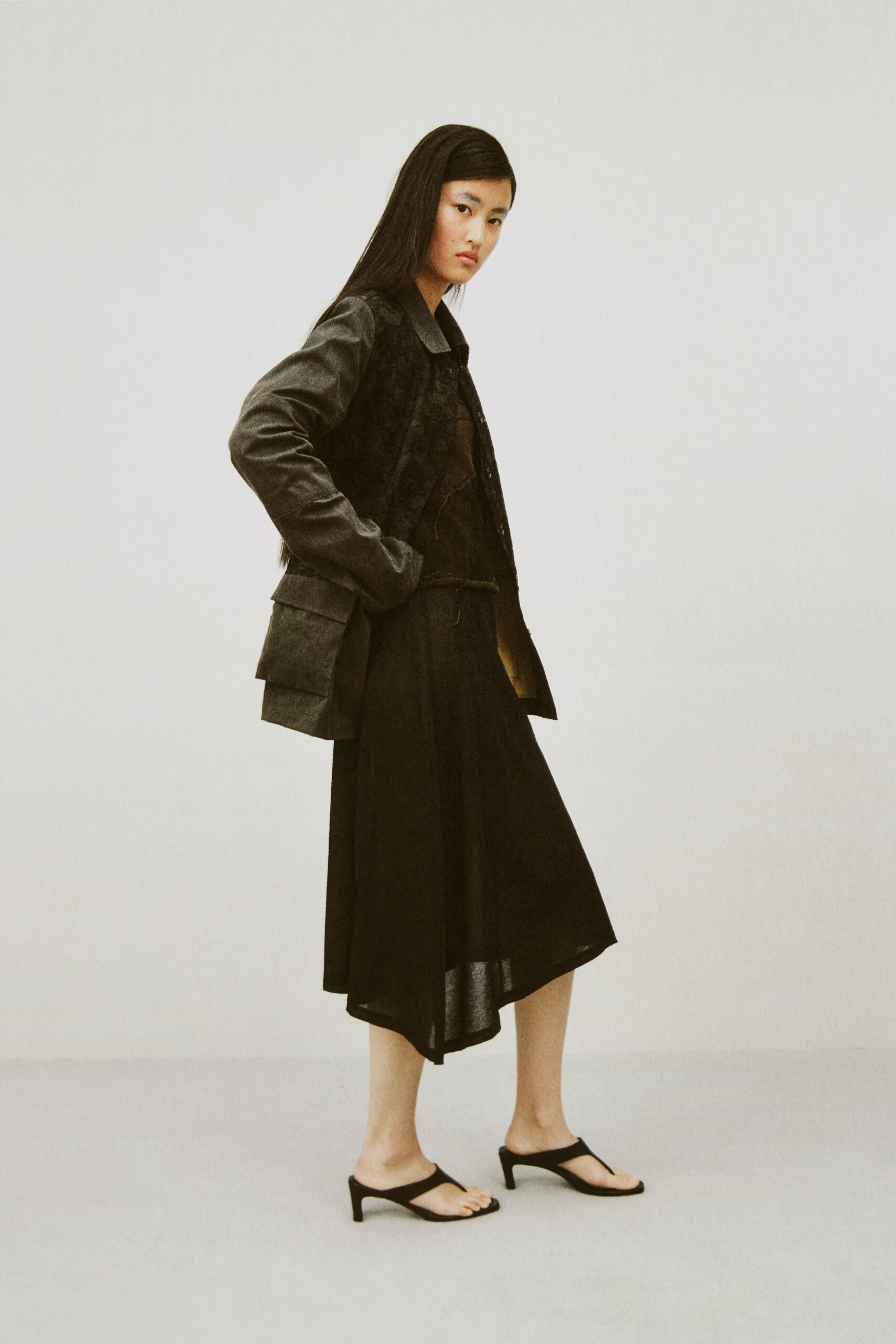 black structured jacket and midi skirt