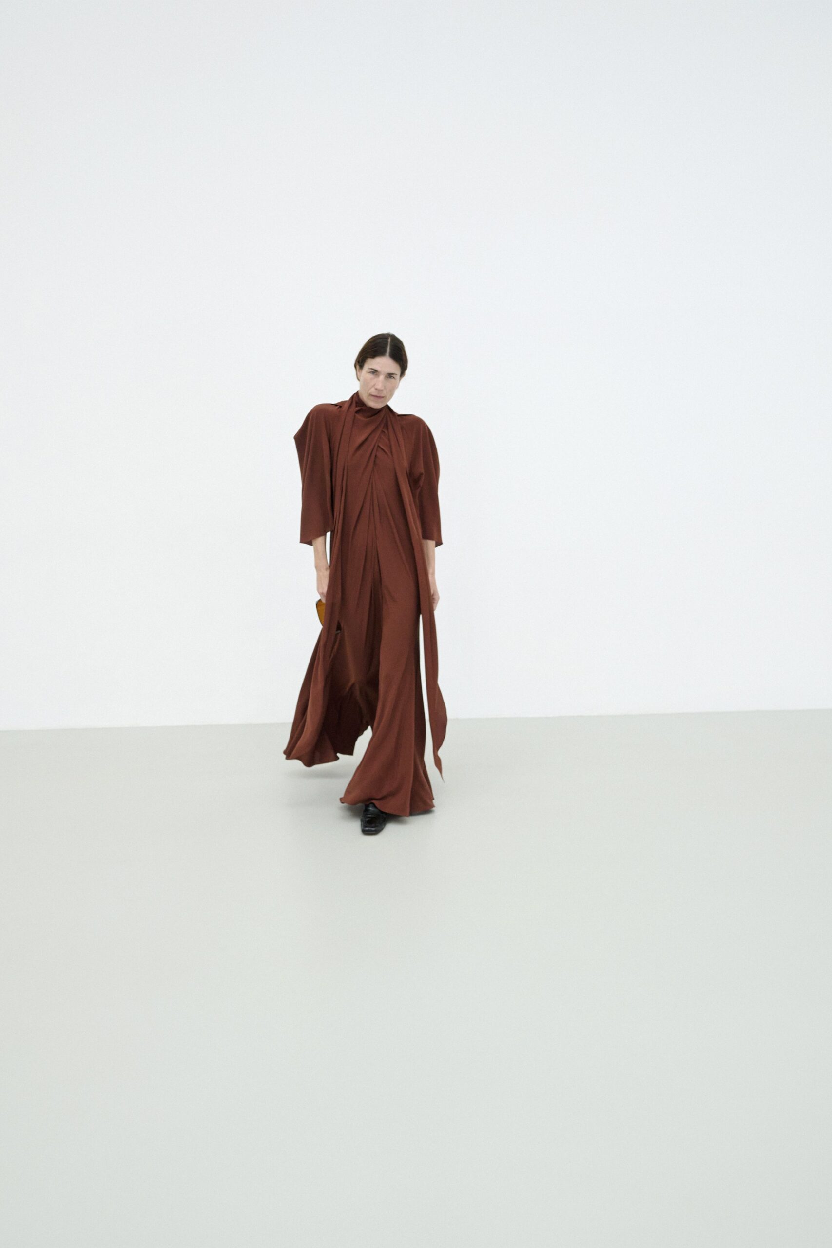 brown silk long-sleeve high-neck relaxed draped maxi gown