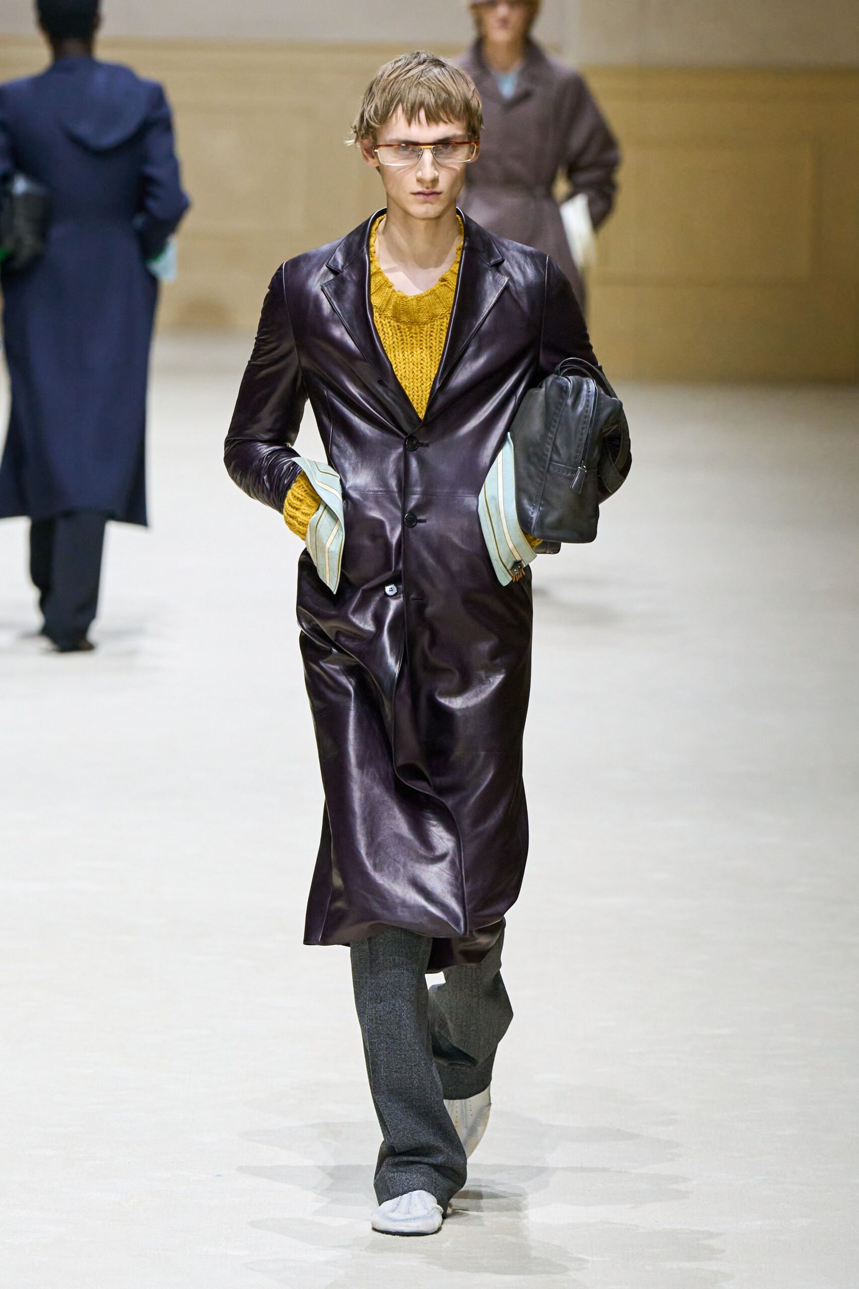 purple leather coat with yellow sweater