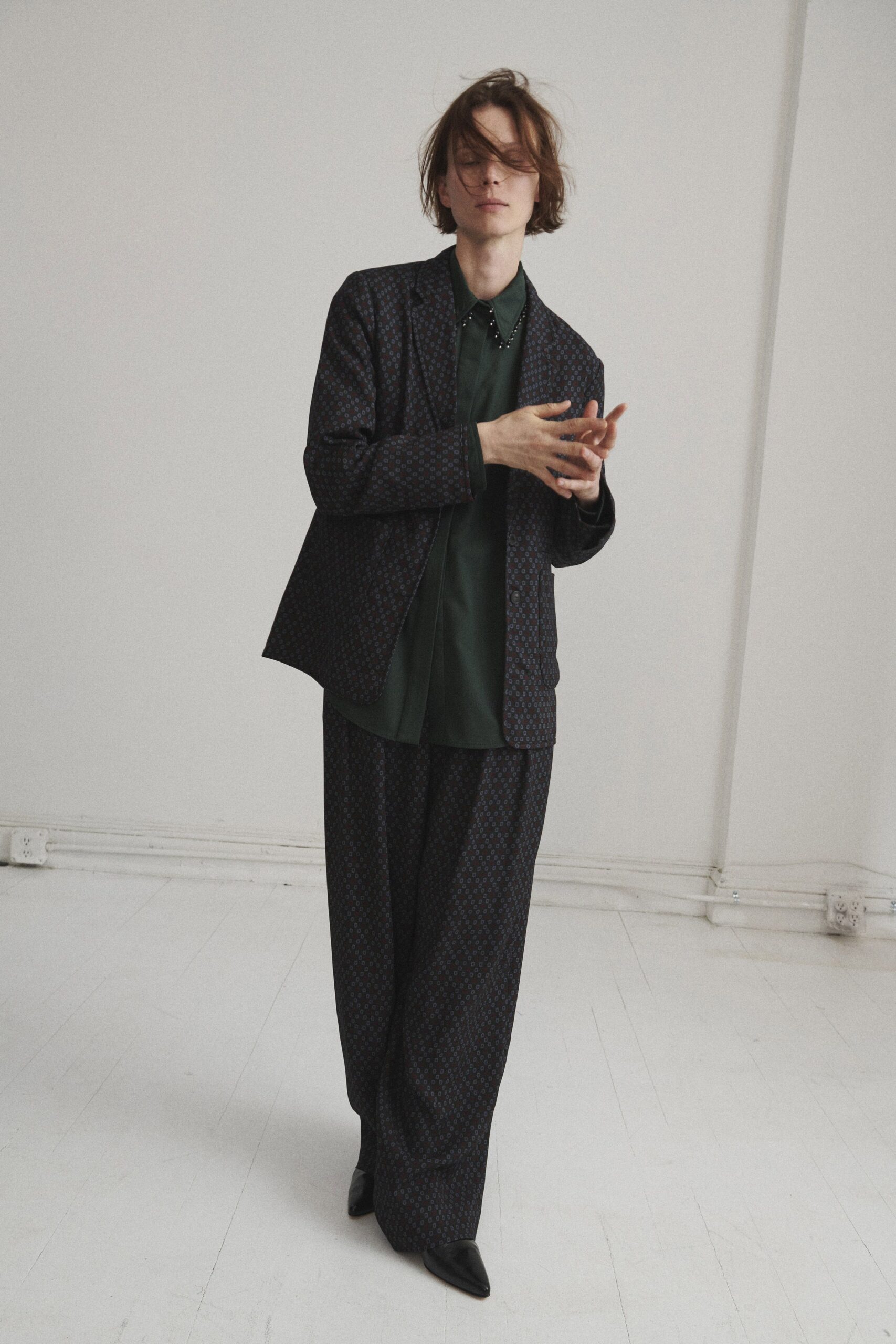 black cotton long-sleeve collared tailored printed blazer