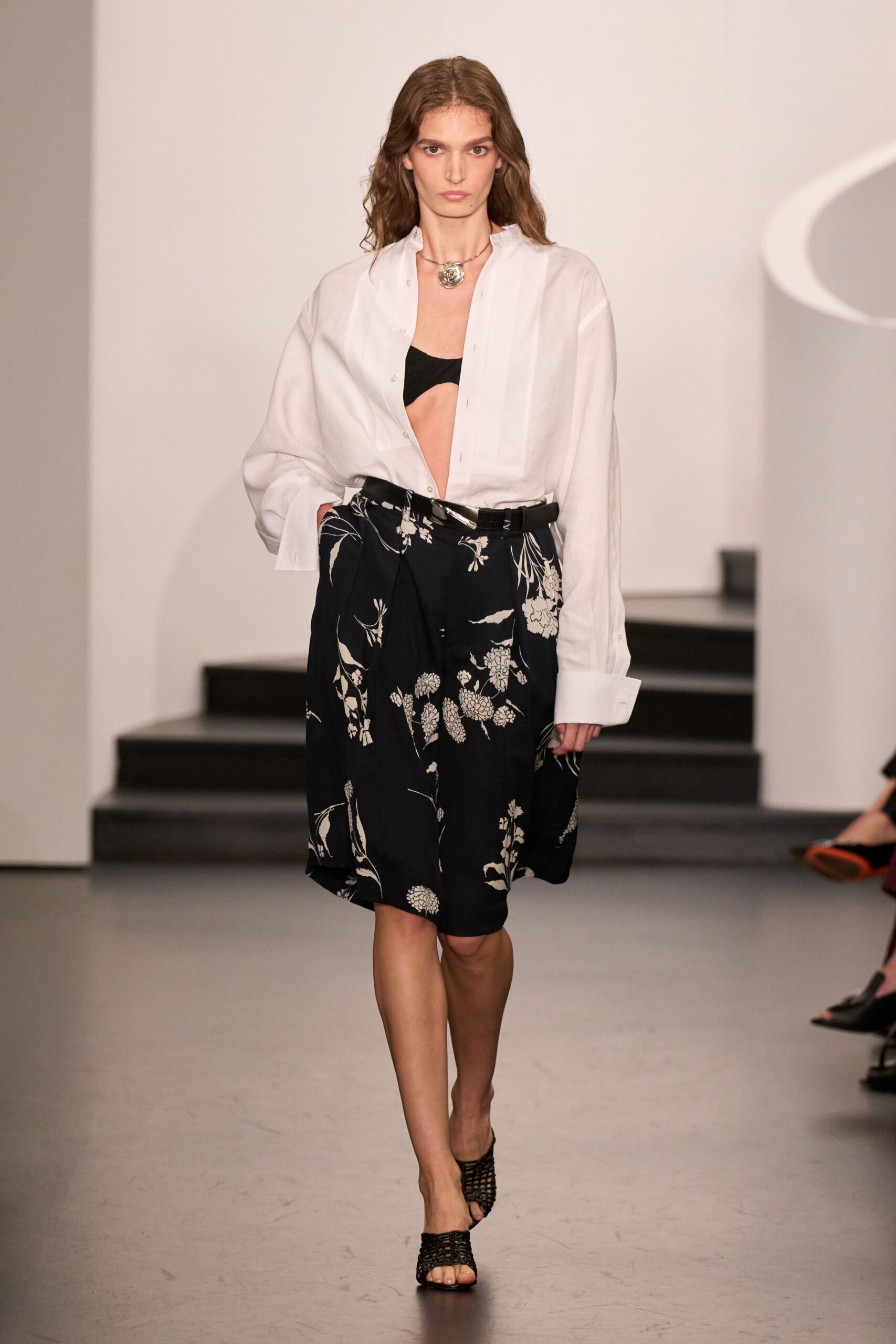 white shirt black printed skirt