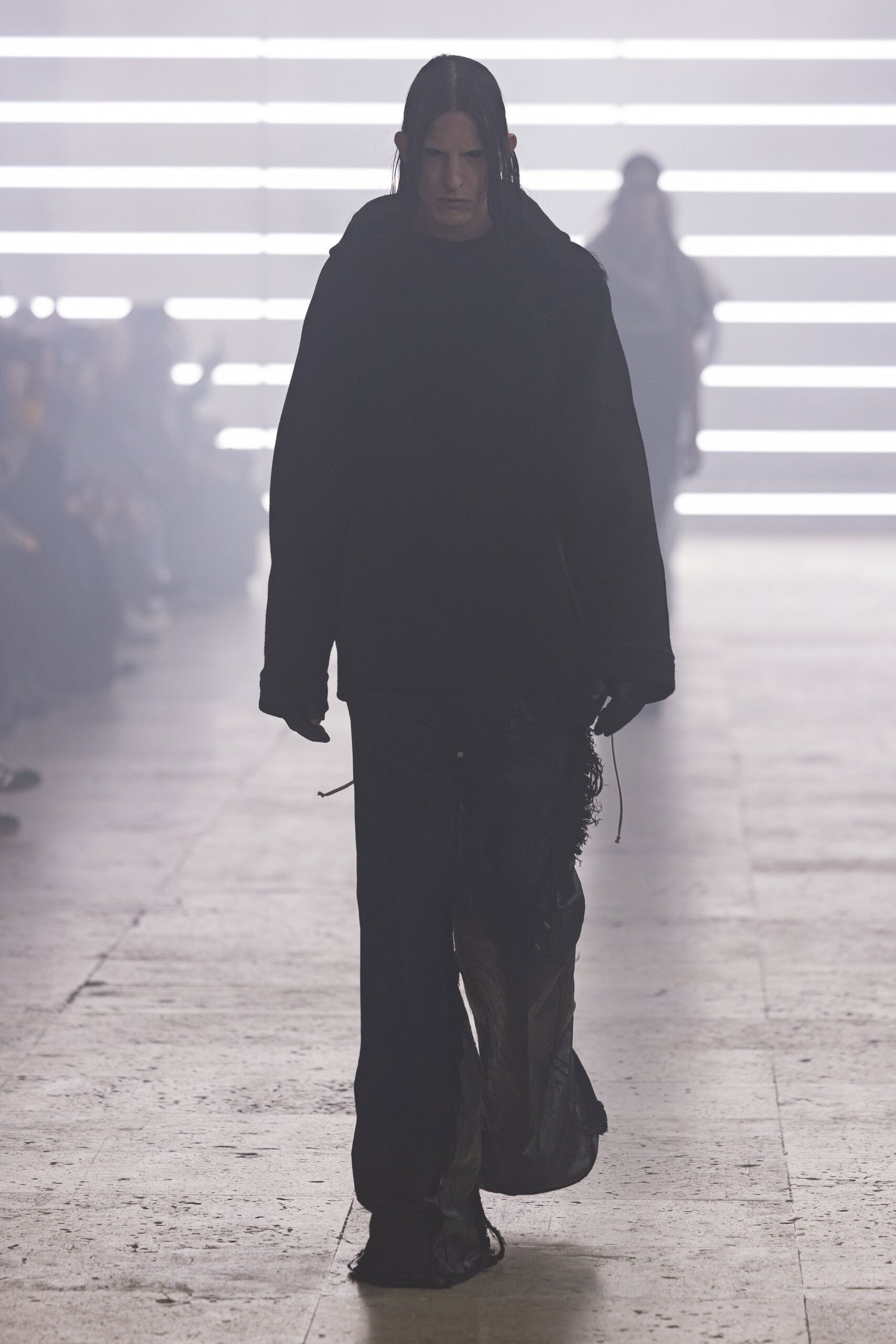black oversized top and relaxed pants