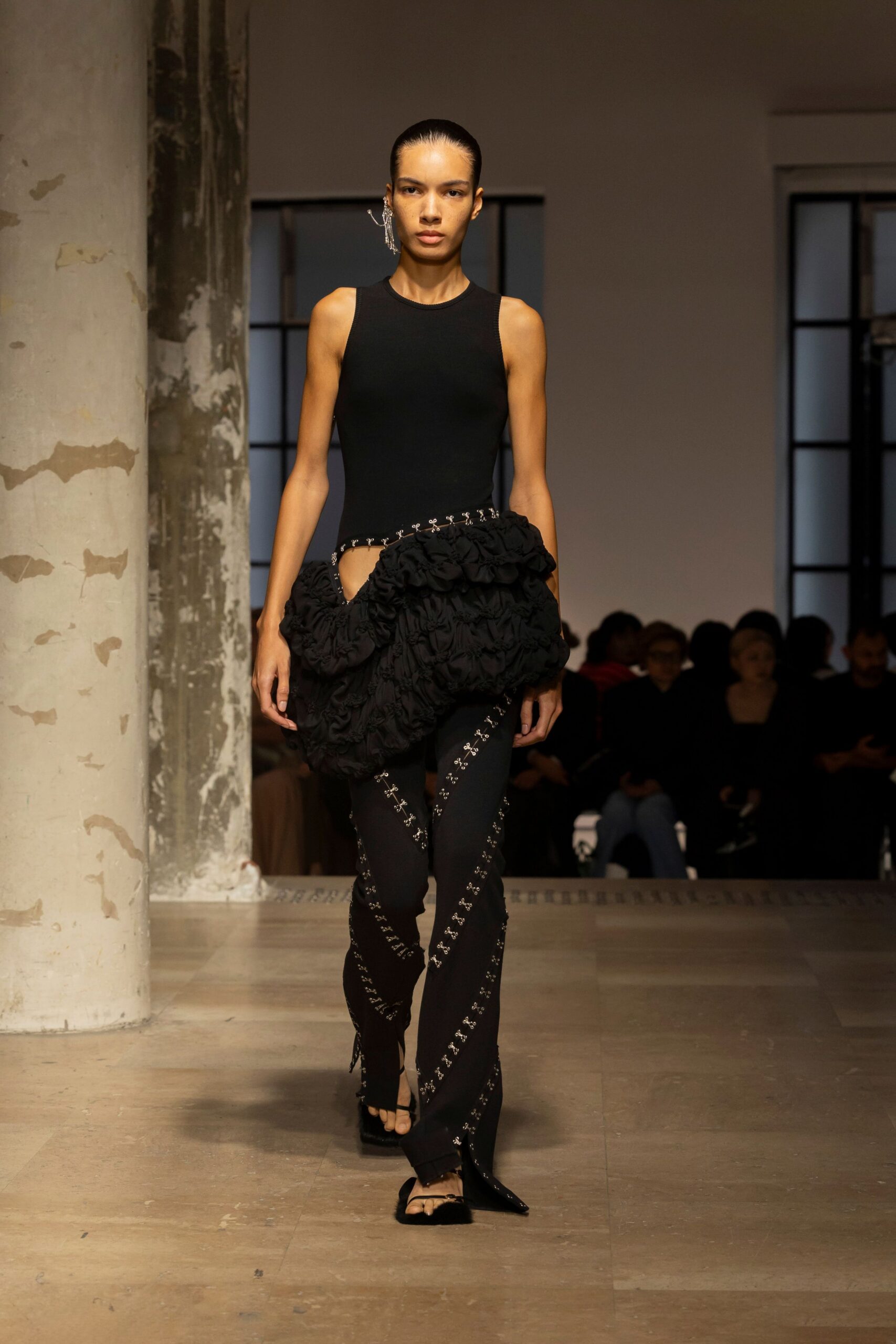 black fitted top with ruffled skirt
