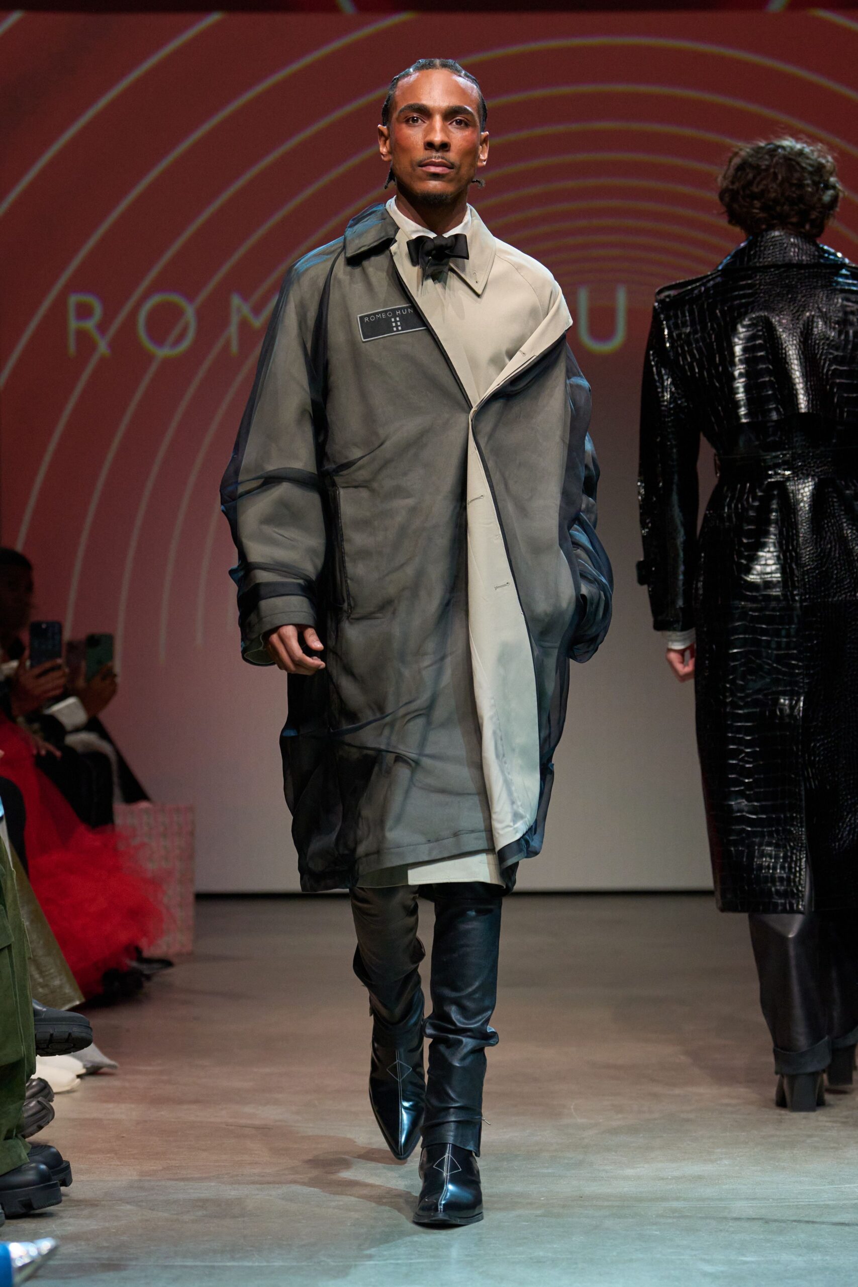 black gray vinyl coat with leather shoes