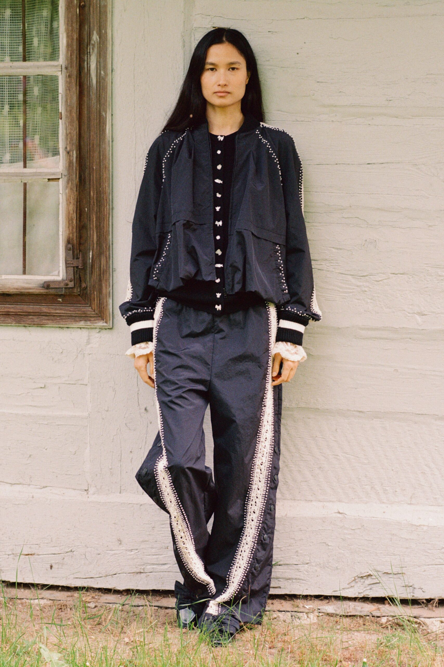 black cotton long-sleeve collared relaxed buttoned layered jacket