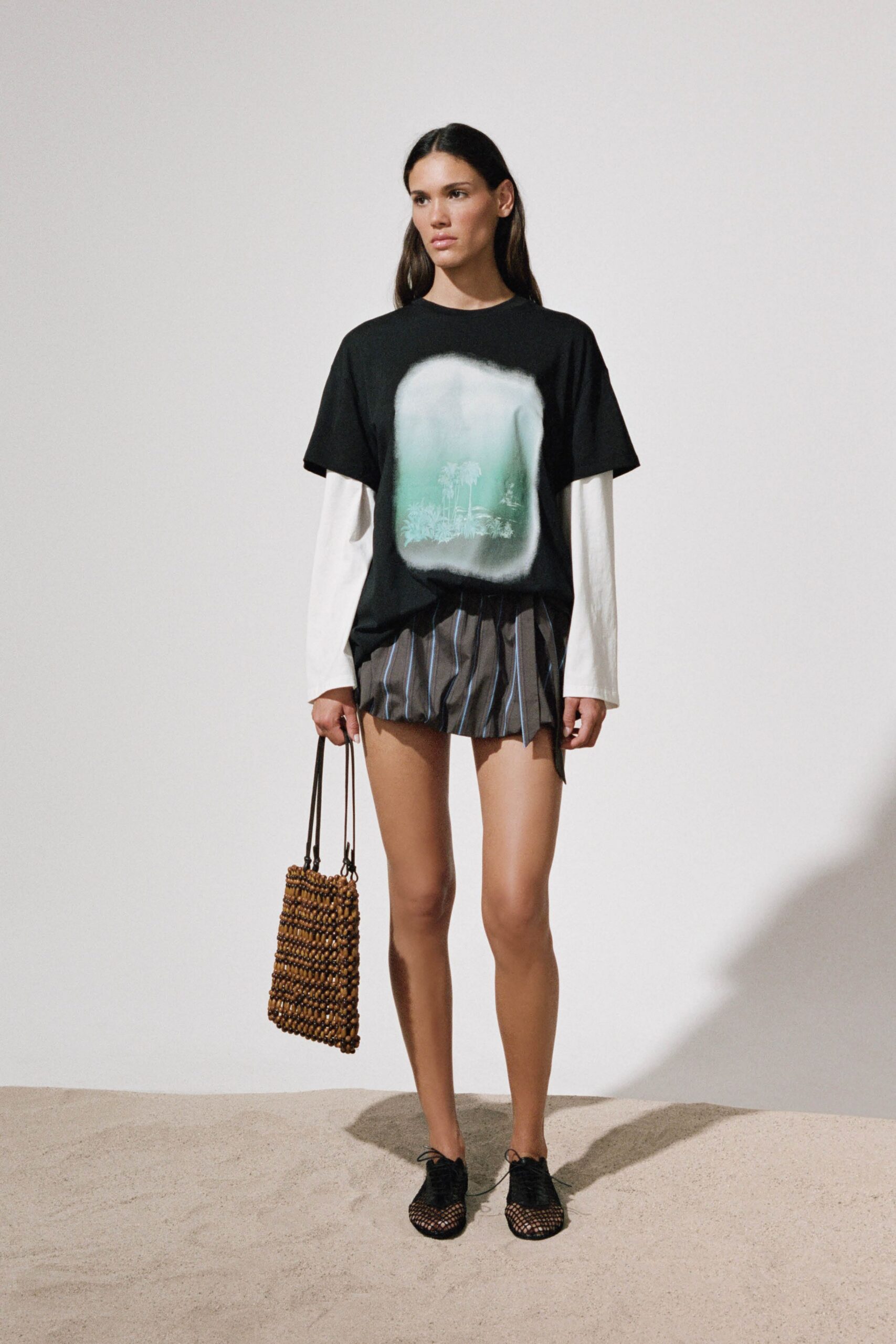 black t-shirt with gray shorts