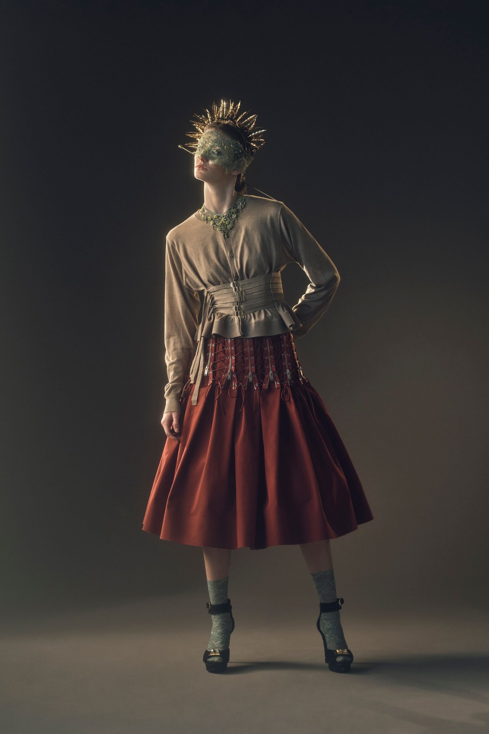 beige top red midi skirt