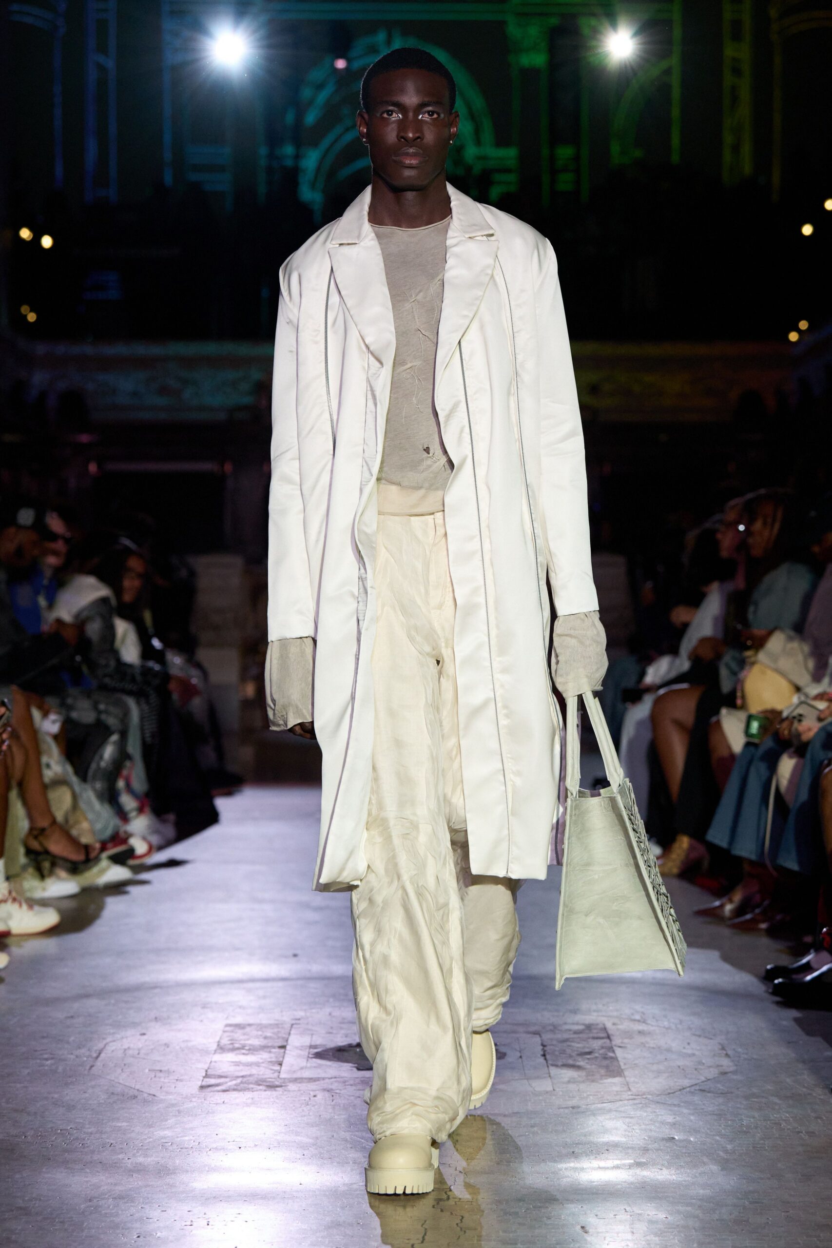 white coat beige top relaxed pants