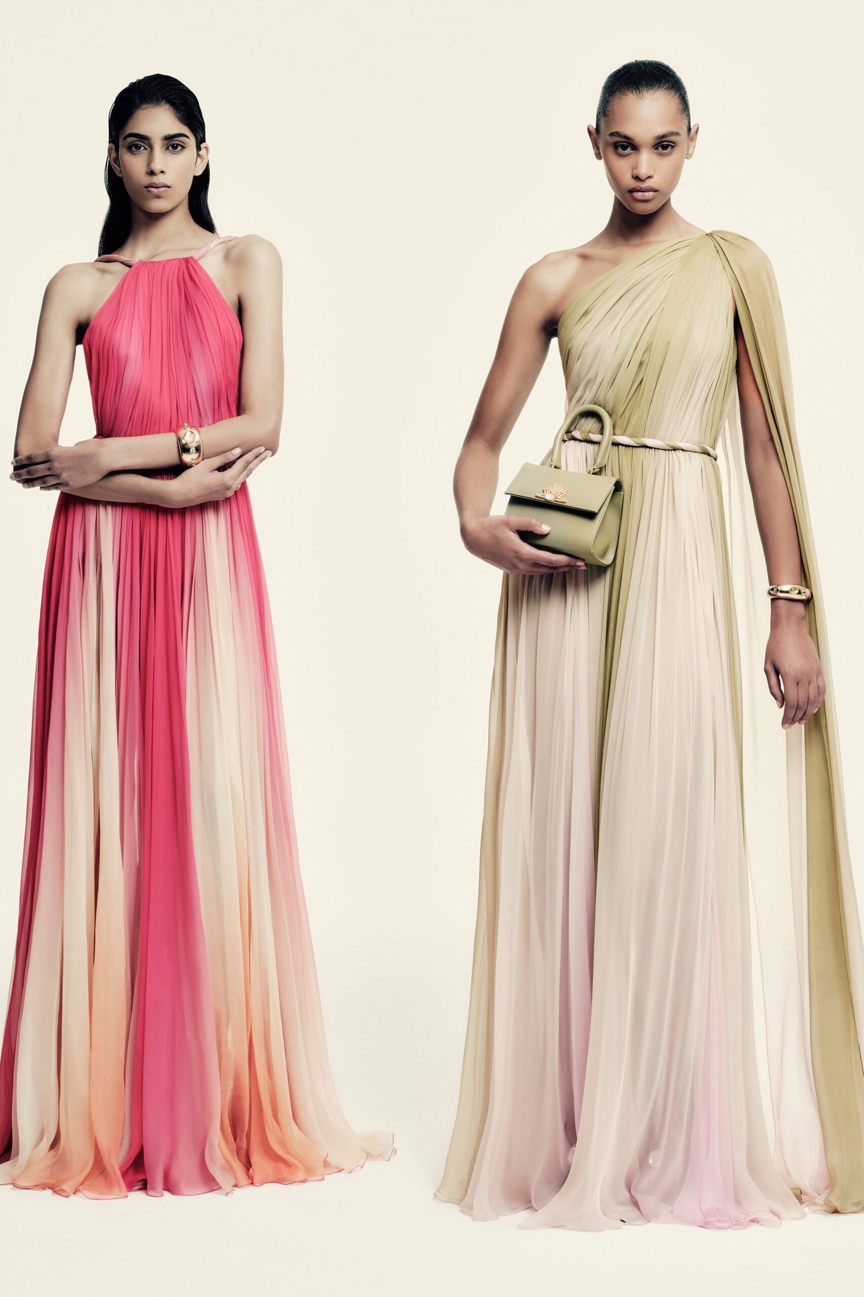 beige chiffon sleeveless off-shoulder fitted pleated flowing gown